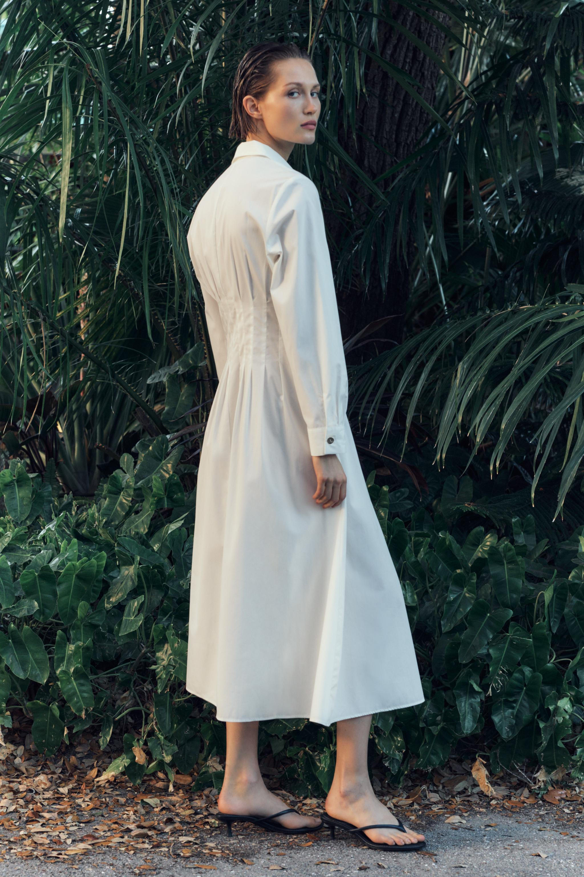 Midi dress with lapel collar and long sleeves. Fitted waist with pleats. Front button closure. | Zara US