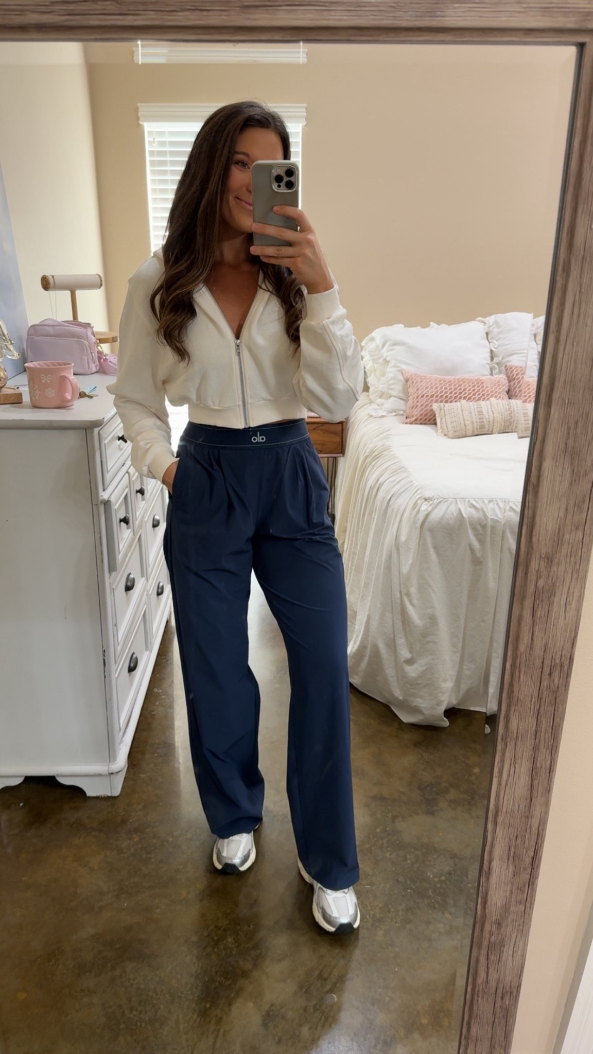 Alo cropped zip up with trousers! I’m wearing a medium in the cropped jacket (ivory color) and small tall in the trousers (navy color). Jacket runs pretty true to size but I could have sized up to a large for a little more room if that’s what you like! I’m 5’7 and it doesn’t show any skin when worn with high waisted bottoms! #alo #alotrousers #alocybermondaysale