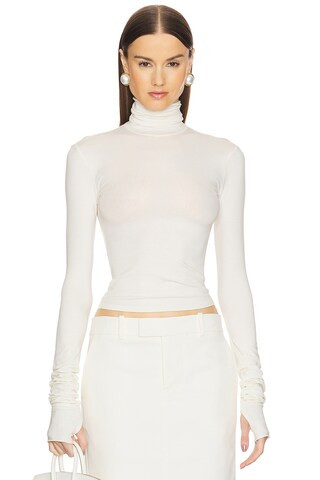 Helsa Long Sleeve Turtleneck in 2nd Skin Jersey in Cream from Revolve.com | Revolve Clothing (Global)