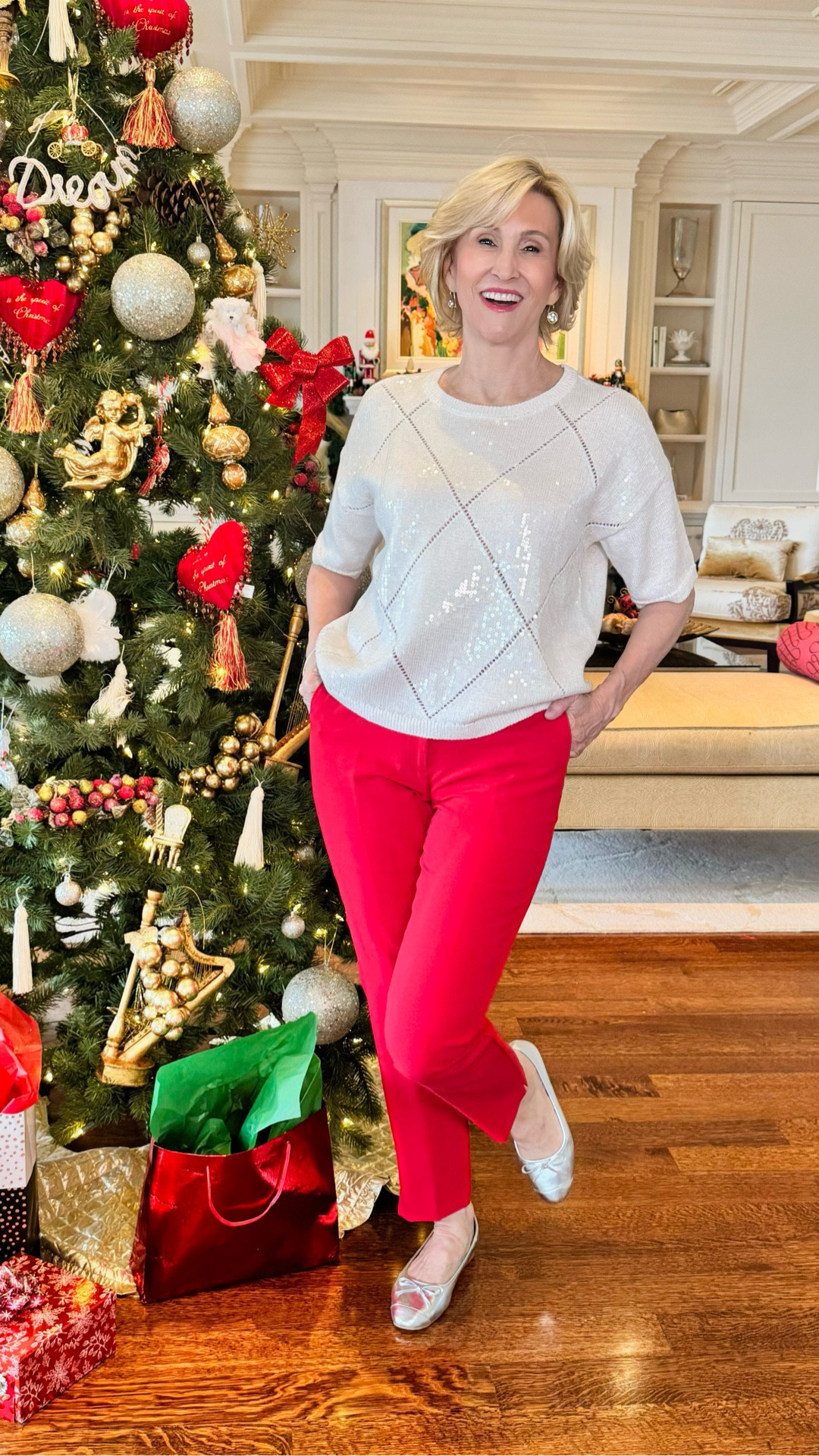 Festive, fun, and full of sparkle ✨🤍❤️
This white and silver sequin diamond-shaped top from Macy’s instantly feels holiday-ready, and pairing it with bold red pants from Talbots makes the look pop. Silver ballet flats keep it polished and playful—perfect for holiday gatherings that call for a little extra shine 🎄💫

#LTKHoliday #LTKOver40 #LTKSeasonal