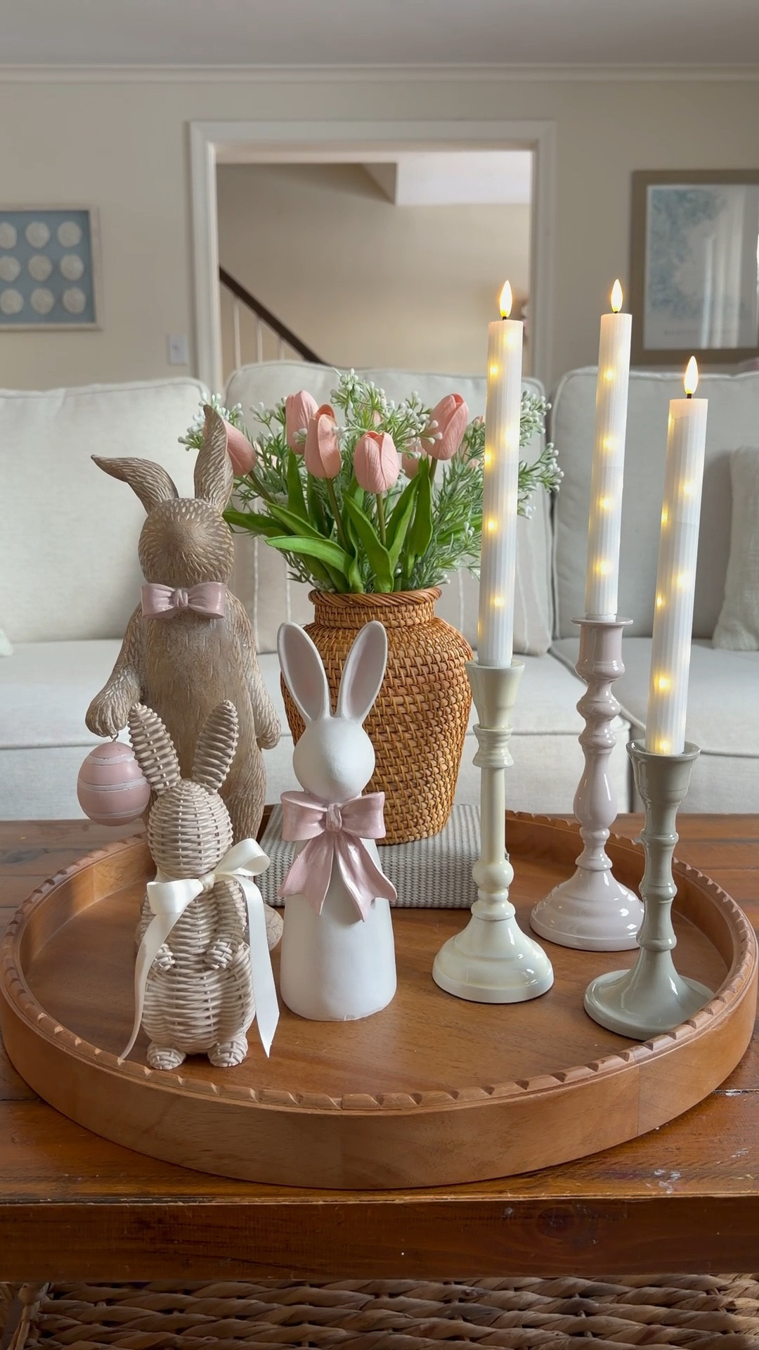 The spring vibes are strong with this centerpiece! I love these bunnies and this rattan vase and the combo of these pastel antique candleholders with the light up real-wax candles! 

#LTKSeasonal #LTKHome