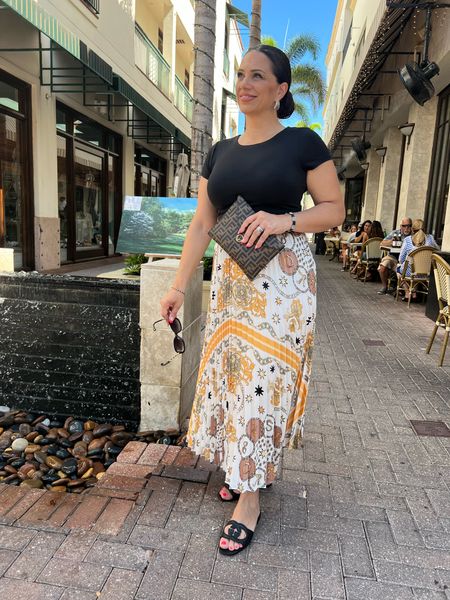 Wore this outfit in Naples and my midi skirt from @Sandro is 50% off.
Such a great deal for a classic skirt! 

#LTKsalealert