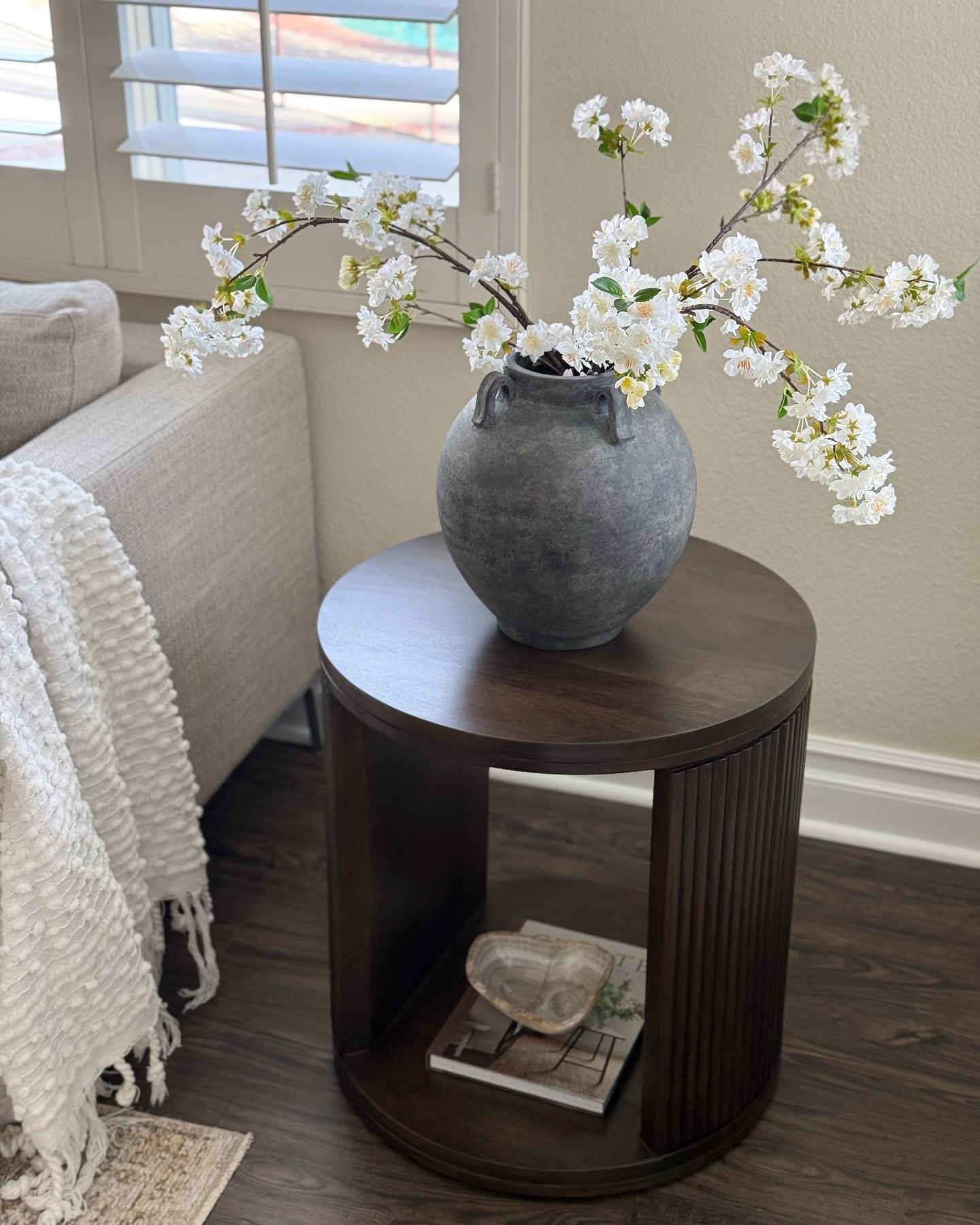 Sharing some stills of this beautiful new addition to our living room from @joonloloi . The warm color and fluted details of this side table add the perfect touch of elegance to this corner. 

Comment SHOP for the link! 

Did you check out their new Spring collection? I’ll be sharing my favorites in stories! 

#gifted #joonloloi #sidetabledecor #warmneutrals #springvibes

#LTKSeasonal #LTKHome #LTKSpringSale