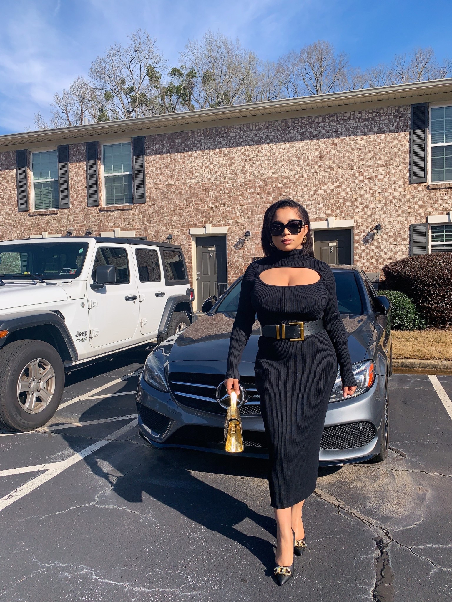 Friday finally showed up… and so did I. After a long week of meetings, deadlines, and giving your all, you deserve to clock out and step into something that feels just as good as freedom. This look is my little reward to myself - cozy, classy, and confidence-boosting all at once.
I slipped into this black knit sweater dress and cinched my waist with a gold belt because even comfort should feel luxurious. Threw on my Versace sunglasses, grabbed my gold mini bag, and finished strong with black pump heels - because happy hour deserves main-character energy. And let’s be real… it’s cold outside 🥶, but cute and warm can coexist beautifully. My trench coat is in the car just in case it gets colder later at night. If you’ve been wanting that perfect winter dress that hugs in all the right places and makes you feel put-together without trying too hard , this is your sign.
 Scroll down to shop every piece and treat yourself. You earned this look. 🖤
 $50 black dress, $100 black dress, $200 dress, black dress, $50 dress, black knit sweater dress, friday outfit idea, happy hour outfit women, winter date night outfit, gold belt outfit, versace sunglasses women, gold mini bag outfit, black pump heels women, cold weather outfits, classy winter look, cozy chic outfit, ltk fashion, women friday style, little black dress winter, elegant casual outfit


#LTKPetite #LTKootd #LTKgrwm