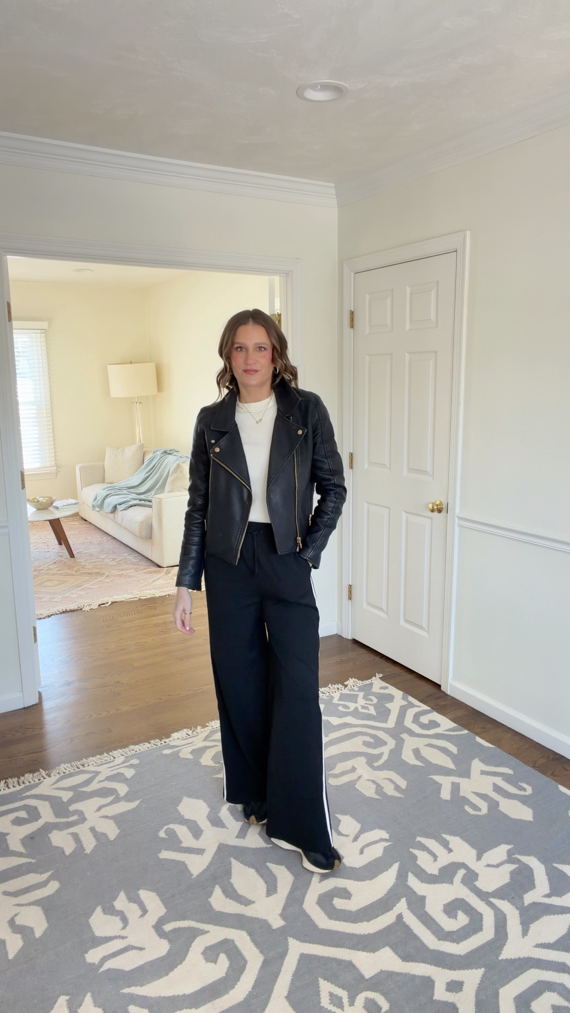 Today’s outfit of the day. Loving these track pants and how the zipper goes all the way up the leg! They can be dressed up or down. I’m in a size XS. I paired them with my Target sweater and an old faux leather jacket.

#LTKootd #LTKOver40 #LTKTall