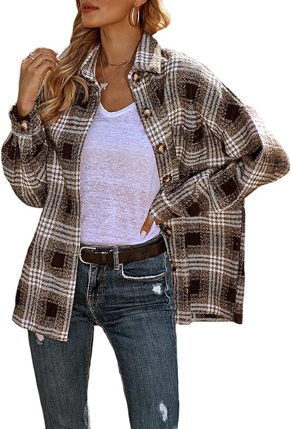 Woman in brown fur coat with flannel shirt and jeans fall outfit
