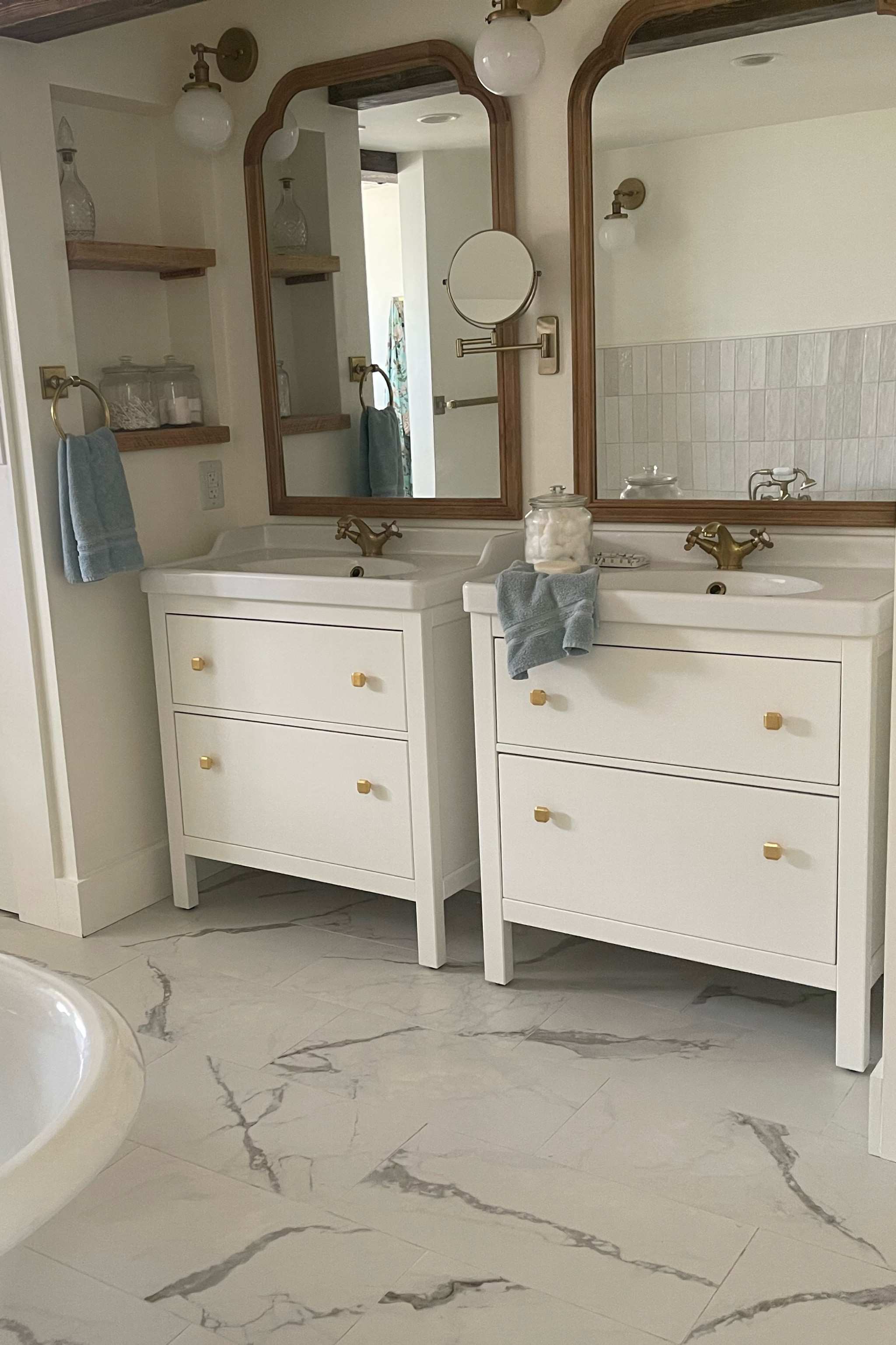 We tucked our vanities in where a closet used to be! 

#LTKhome