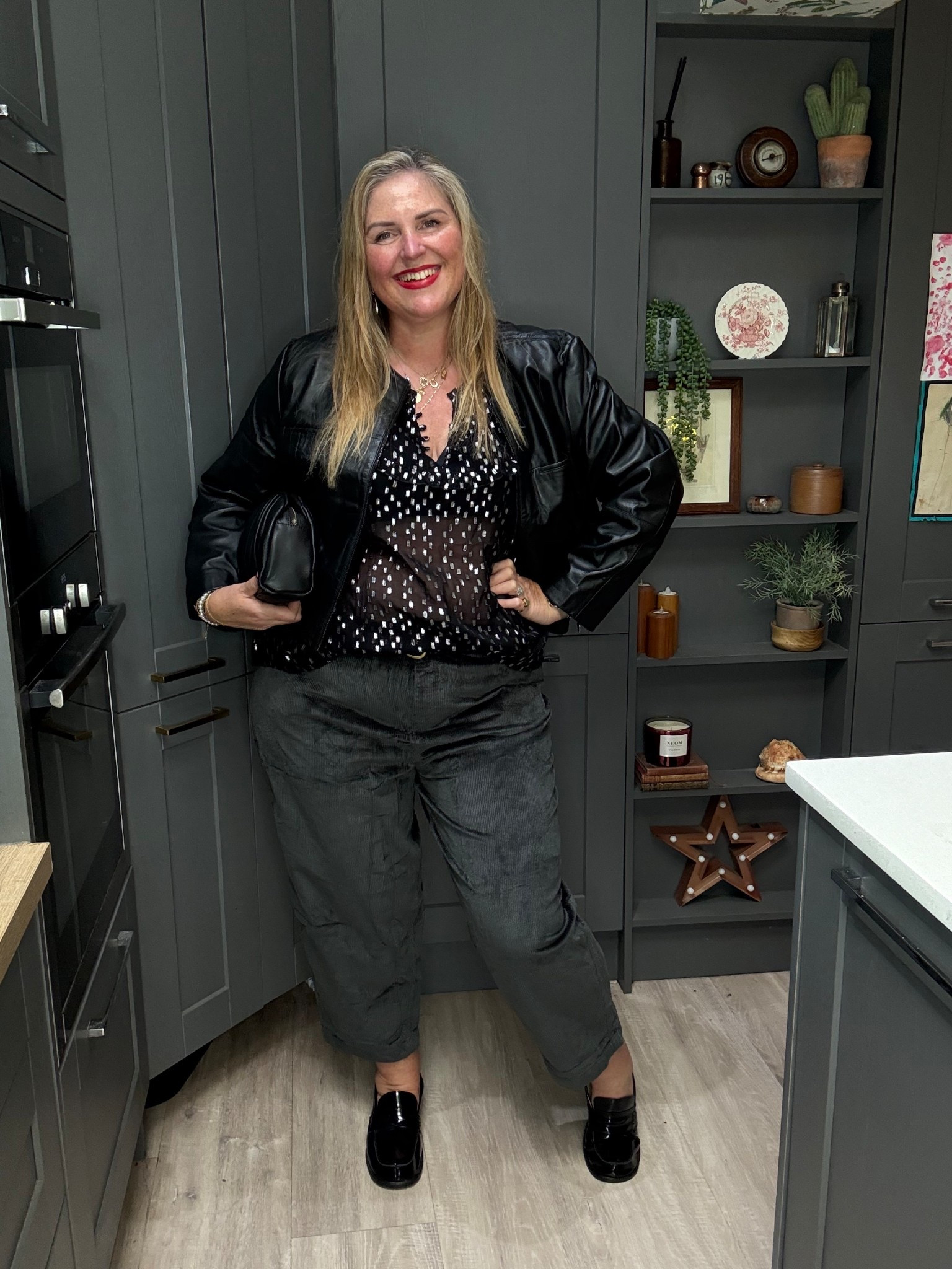 Leather jacket, show k and silver top, black grey cords, loafers, black leather clutch bag black belt,  

#LTKdatenight #LTKcurves #LTKplussize