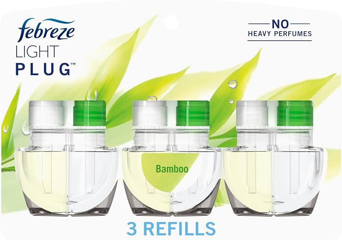 Febreze Plug In Air Freshener, Odor-Fighting Scented Oil Refill, Air Fresheners for Home and Bath... | Amazon (US)