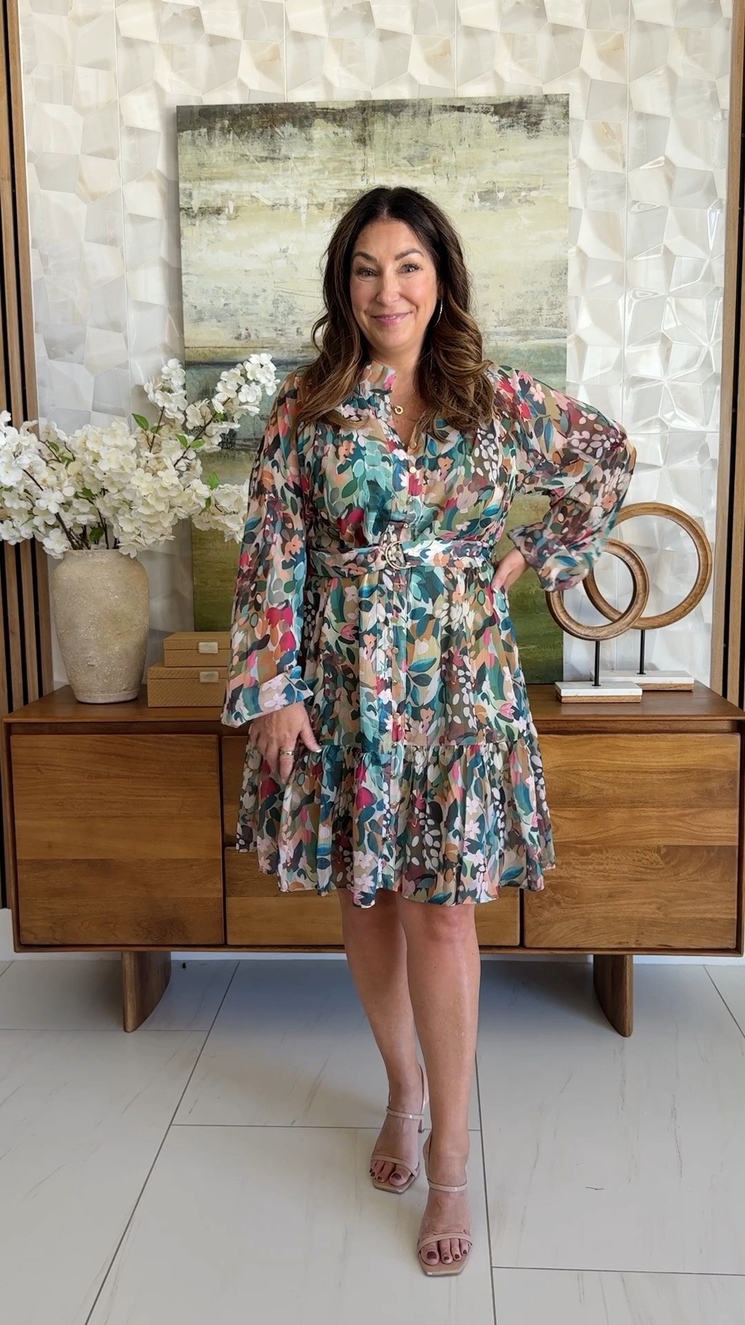 The prettiest floral dress 🌸 Multicolor abstract floral print mini dress with sheer balloon sleeves and a belted waist, styled with a taupe woven bag and nude strappy heels. A colorful wedding guest and date-night dress that transitions summer to fall.

Sizing: true to size, large

#LTKSeasonal #LTKOver40 #LTKWorkwear