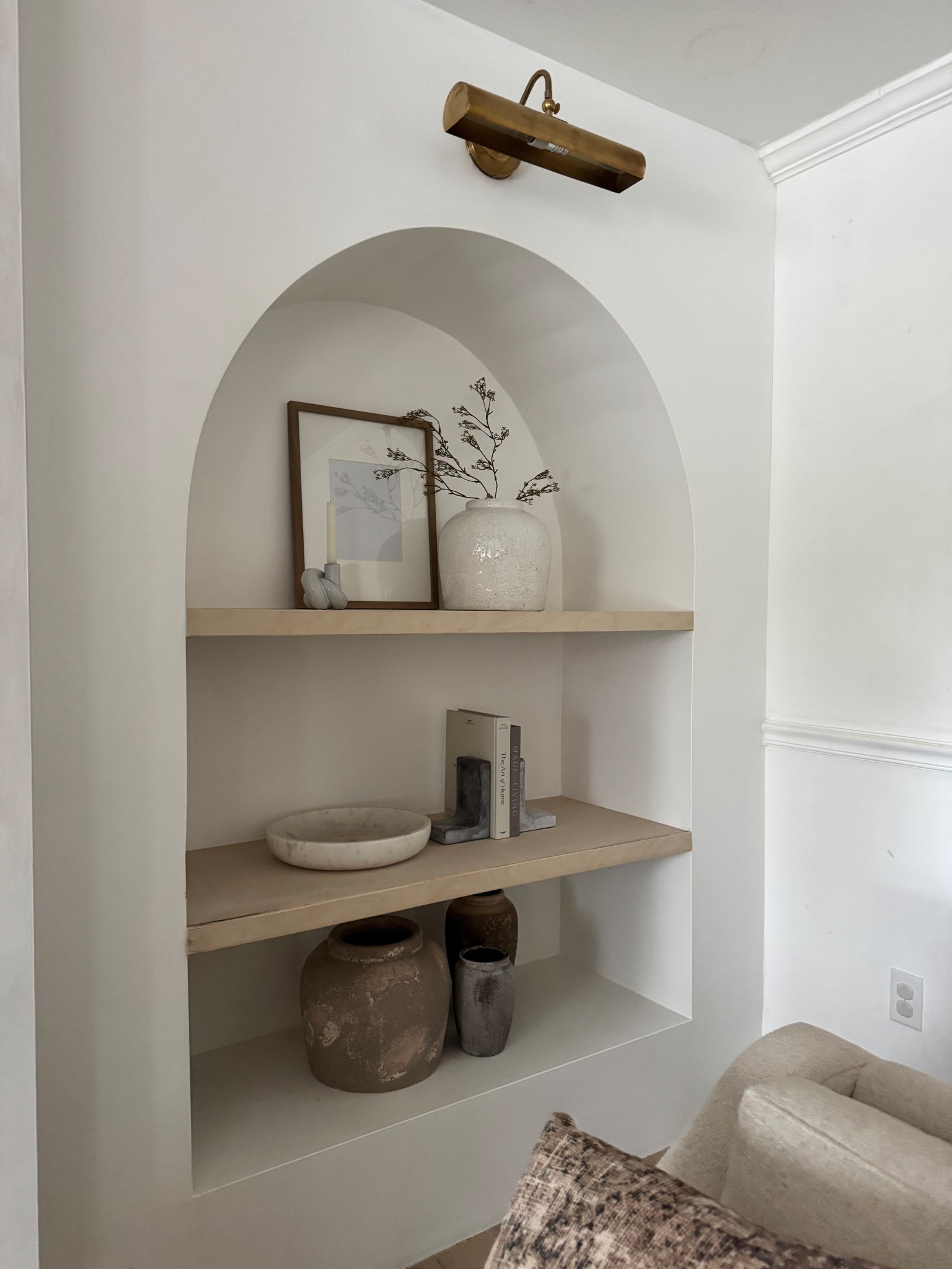 Arched bookcase decor

#LTKHome