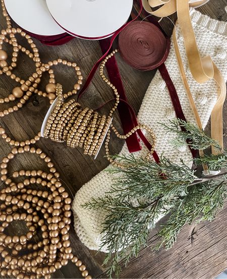 Holiday decor prep from Amazon: gold beads and garland, velvet ribbon. #founditonamazon 

#LTKhome #LTKSeasonal #LTKHoliday