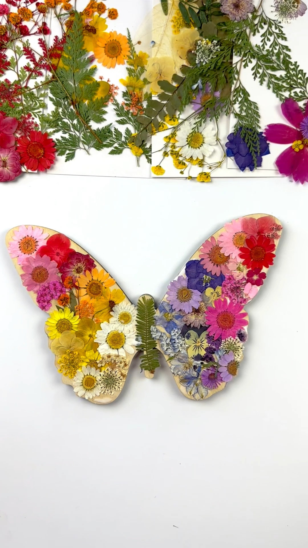 Pressed flowers on wood cutout. I used an 8 inch cutout m but they come in all different sizes and thickness. 