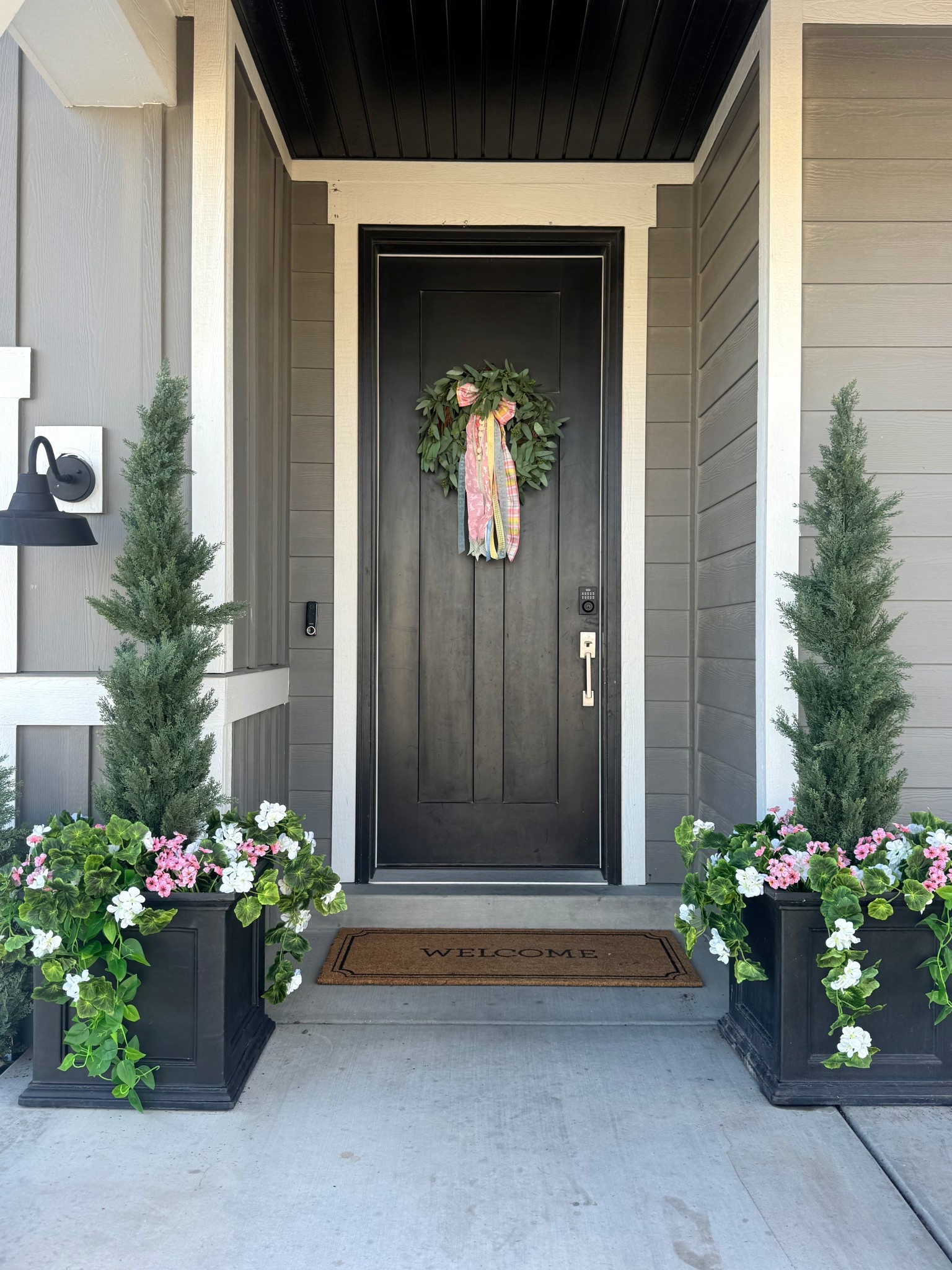 Spring planters... but make them Easter ready.
I started with a 5 ft faux cedar, added UV-resistant faux geraniums, trailing vines, and soft pink spring florals to fill everything out.
My trick: fill the planter with real dirt so everything sits naturally.
Then I topped off this spring look with this cute Easter ribbon from @knotandspool #dehartdesigns #easterporch
Full, simple, and Easter-ready in minutes. 

#LTKHome #LTKSpringSale