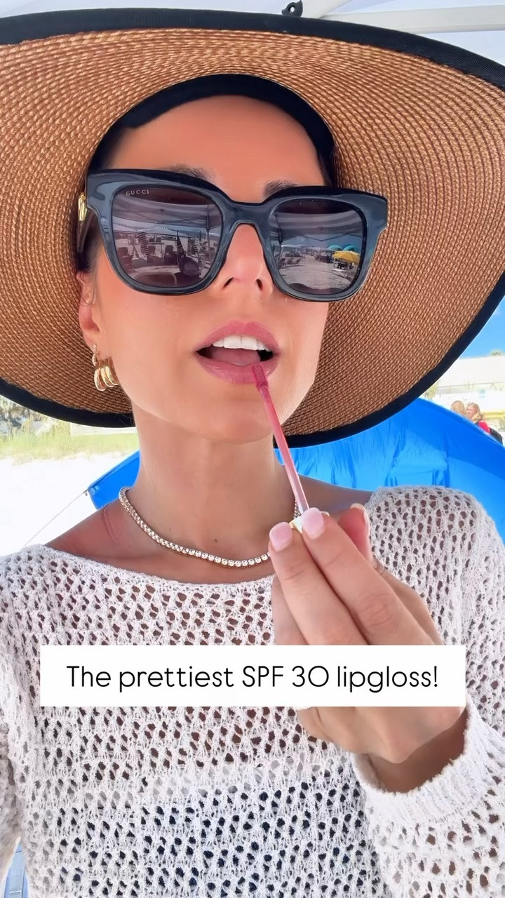 My favorite SPF 30 lipgloss in color Camillia. Target swimsuit coverup. Beach days are the best days 🇺🇸🇺🇸 love this ruffled bikini - one size fits more! Can fit up to size 14. UPF 50+ packable hat. Love these Gucci sunglasses. Amazon tennis necklace. Beach vacation. Summer outfit. 4th of July outfit.

#LTKootd #LTKSwim #LTKTravel