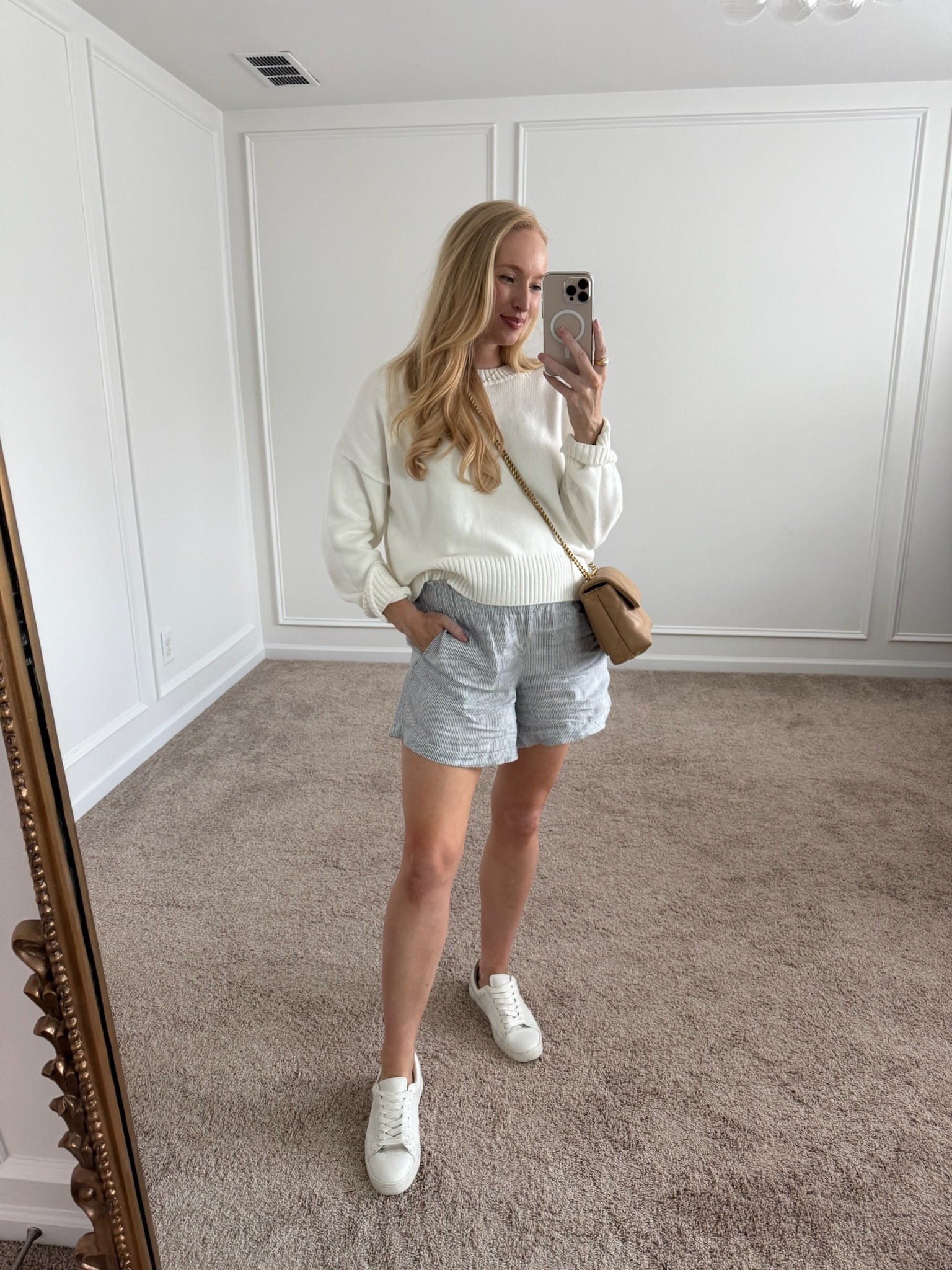 Easy summer days. Cozy sweater + breezy linen shorts = the ultimate effortless pairing. Added a crossbody for hands-free ease and crisp white sneakers to keep it fresh.

#LTKItBag #LTKStyleTip #LTKShoeCrush