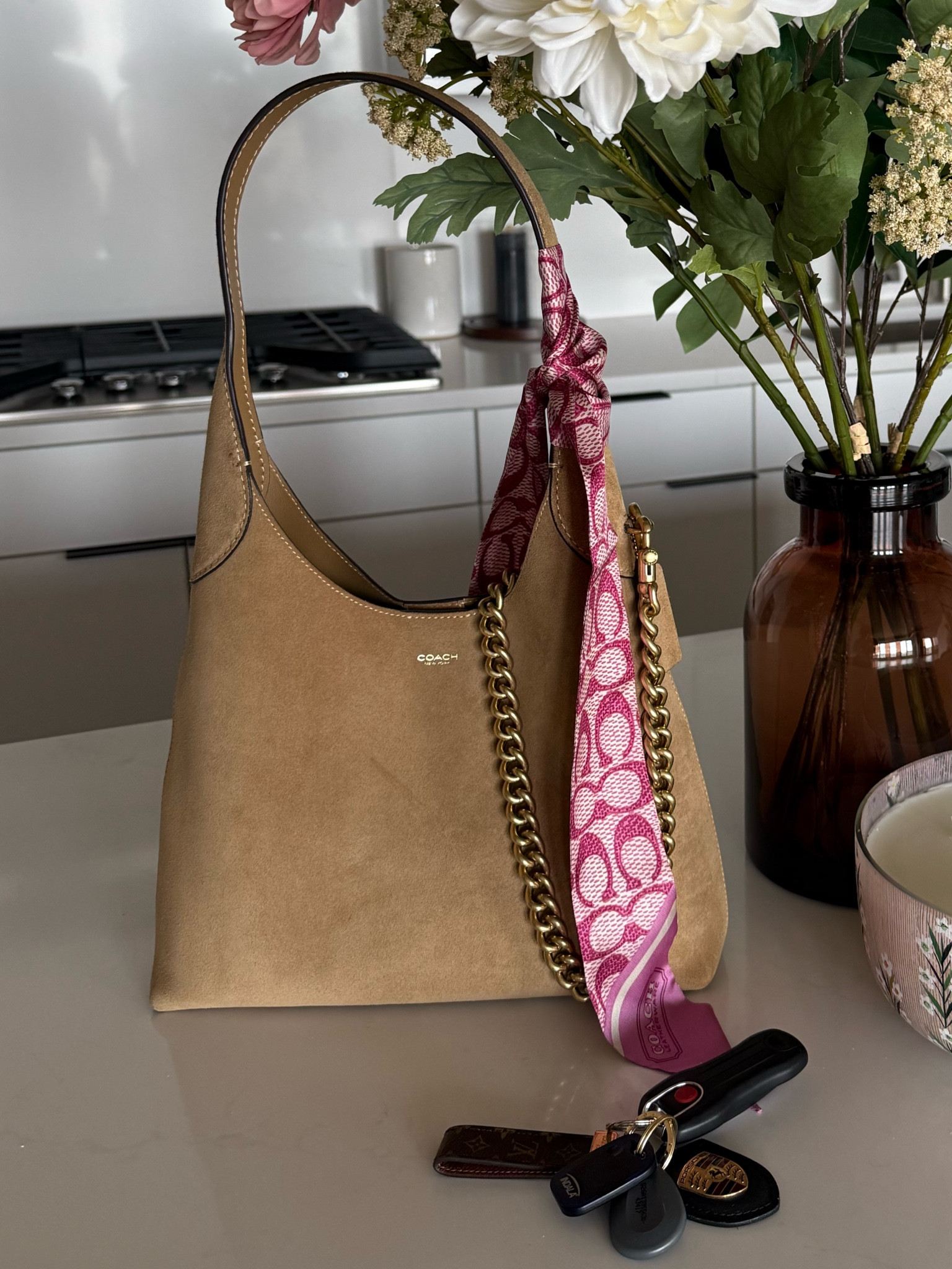 Coach Brooklyn Bag 
Color: Suede/Sand
Scarf Color: Fuchsia 

#LTKSeasonal #LTKHome