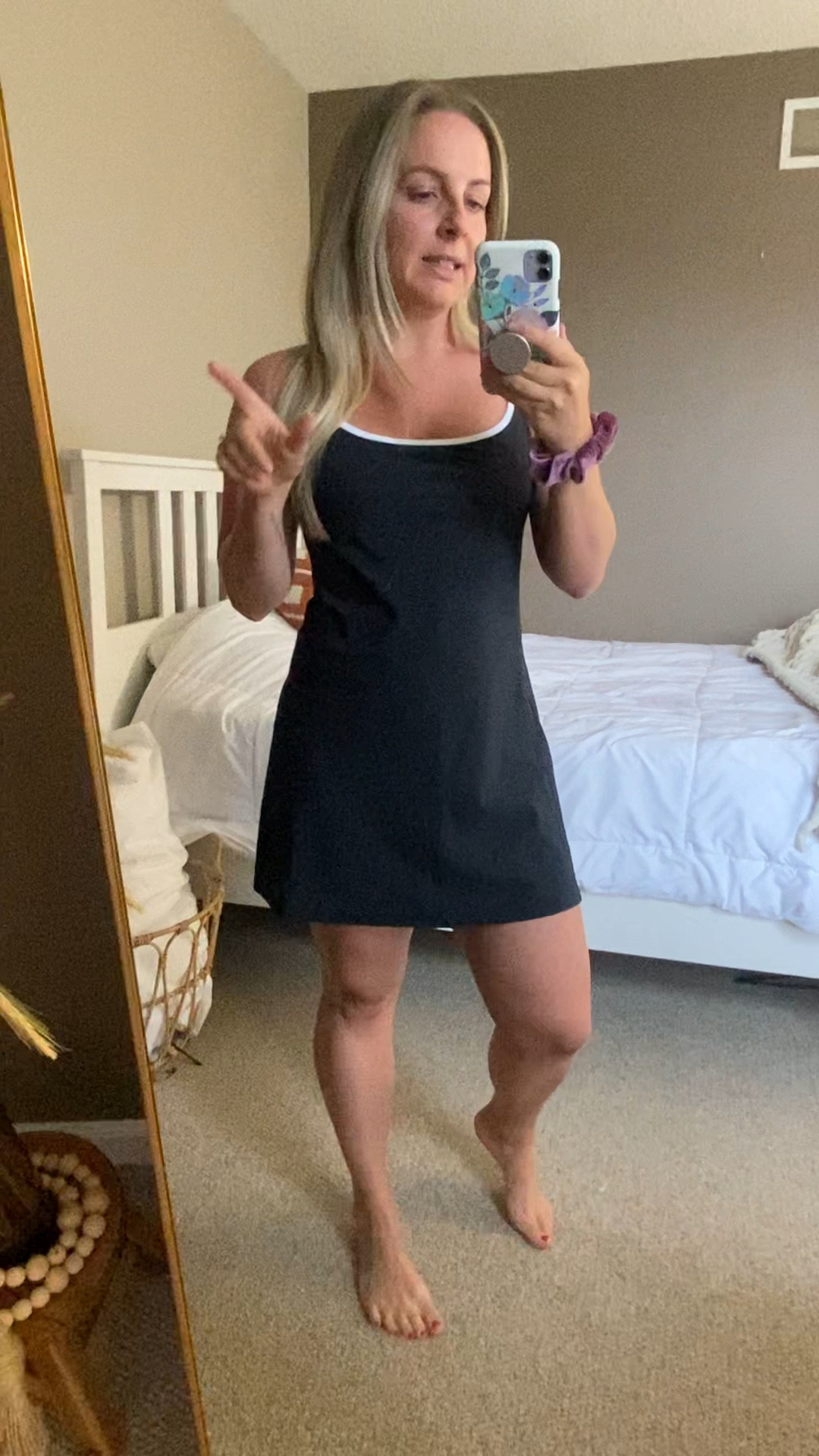 Abercrombie traveler dress 
Tennis dress
Dress with build in shorts & pockets 

5’1 wearing a small, regular. The petite size is too short/ small on me  