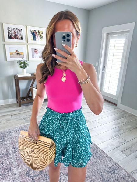 Amazon seamless tank tops in XS. Double-lined + not see-through + high neck! Comes an inch below my belly button and great to pair with high-rise bottoms. Date night outfit. Vacation outfit. Skort in XS. Shoes are TTS.

#LTKtravel #LTKfindsunder50 #LTKshoecrush