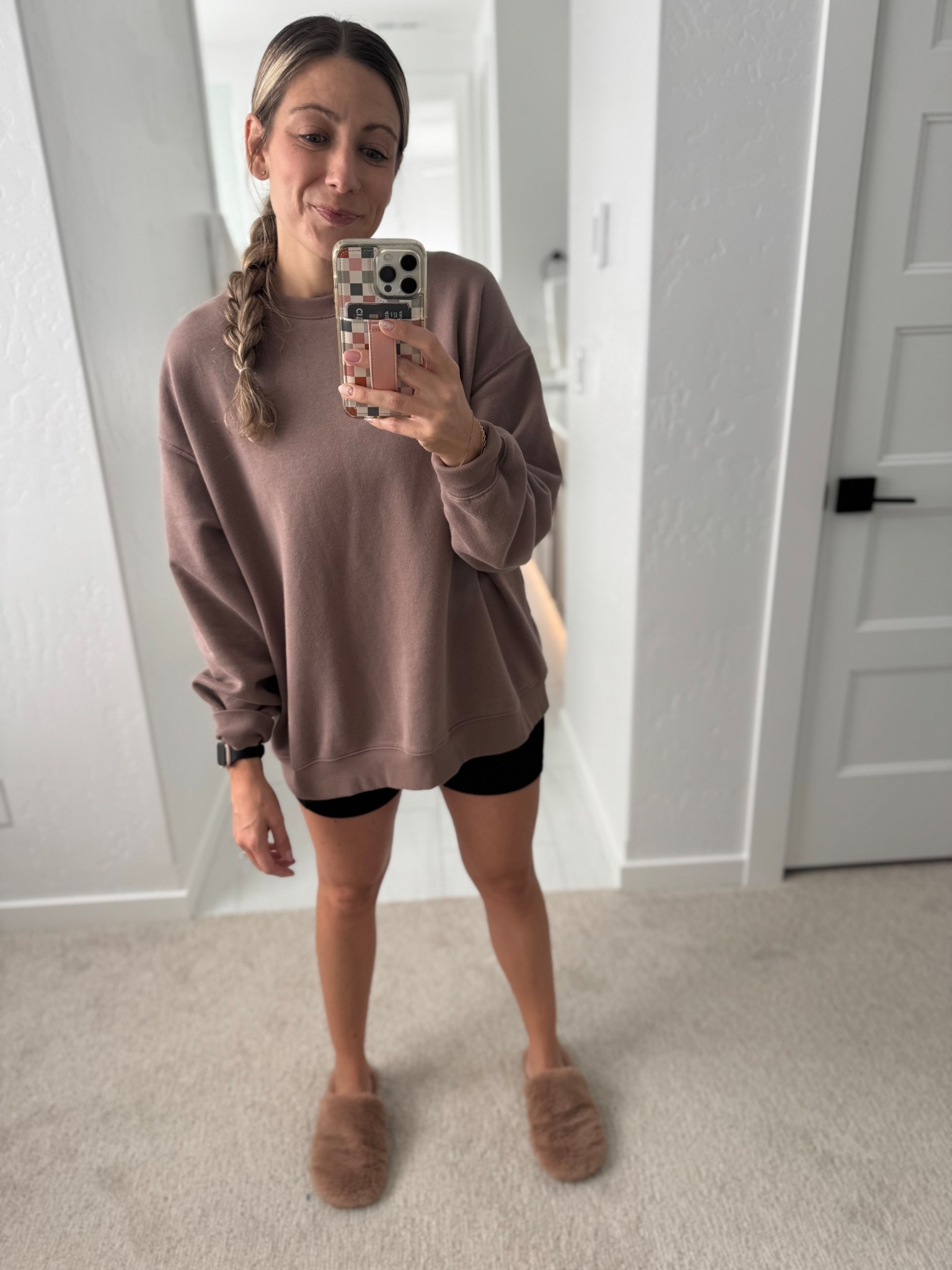When the weather can’t make up its mind and I want to be cozy, I throw on this comfy sweatshirt on over my workout outfit. Love these Walmart sweatshirts. Wearing a size large. Target slippers and my favorite Amazon biker shorts by CRZ  

#LTKStyleTip #LTKActive #LTKFindsUnder50