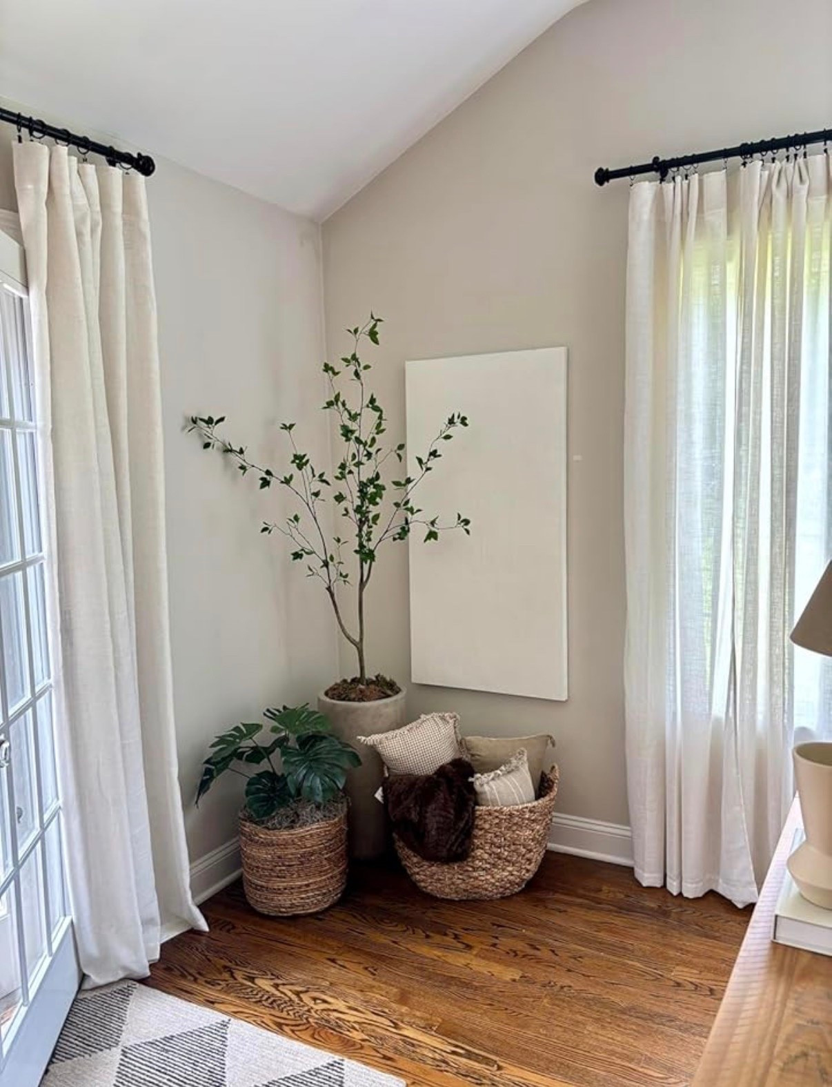 summer home refresh: simple, classic, coastal 

feat. a realistic artificial monstera plant and 5ft citrus tree in bold coastal / cottagecore style planters & wicker baskets 🪴

🍋 Style a plant inside a wicker planter or woven basket to achieve a grandmillennial / coastal cottage style aesthetic this summer!

notes:
👉🏻 wicker coil planter is from Target (sold out in this exact color)



.
.
summer home decorating tips 
interior design tips
designer-inspired linen curtains under $20!
affordable woven planters 
oversized concrete planters
large real touch plants
coastal style home decor
#summerdecor #summerhome #coastalstyle  #affordabledecor #beachhousestyle #cottagecore
#coastalliving

#LTKSeasonal #LTKHome #LTKdayinmylife