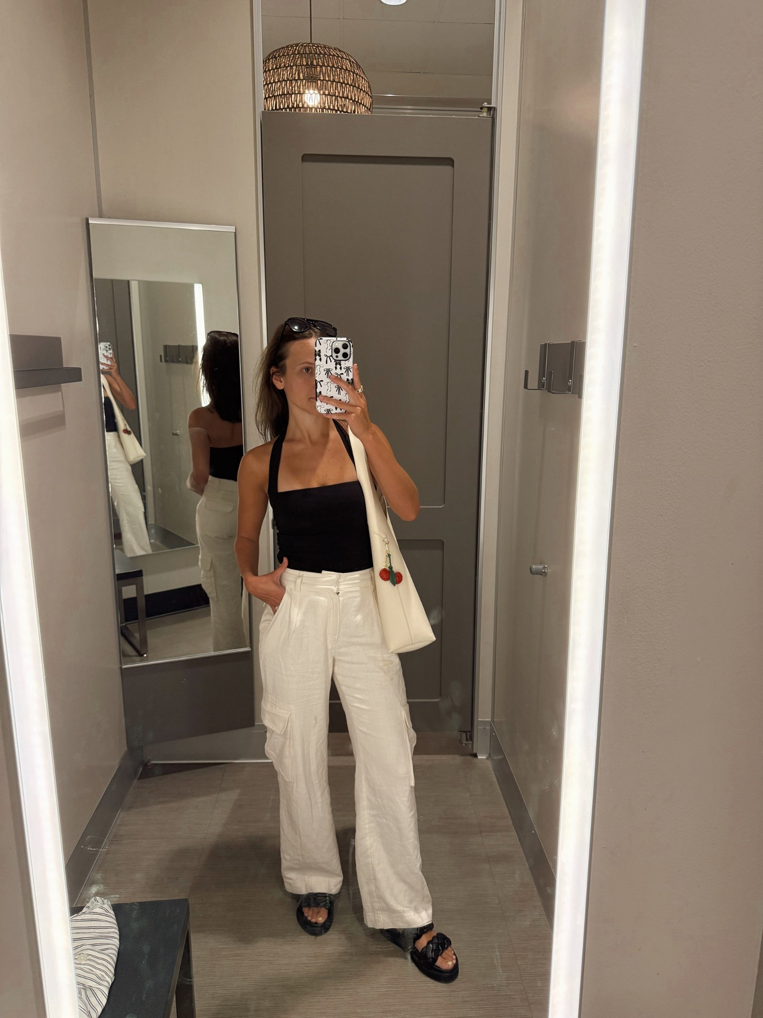 casual summer outfit | obsessed with this aerie halter top, can be styled with athletic wear or dressed up with jeans/pants! 
pants are old Abercrombie! Linked similar 

Abercrombie | linen pants | aerie | halter top | casual summer outfit | coach Brooklyn bag dupe 