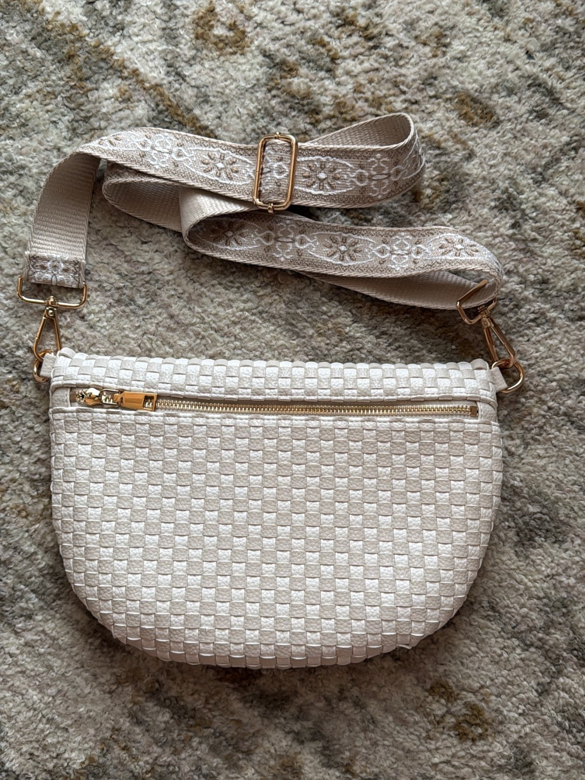 Woven crossbody purse with 2” adjustable strap 
9 color options 
Made of vegan leather 
Water resistant 

I changed out the strap for one that was a little thinner 

#LTKPetite #LTKSeasonal #LTKootd