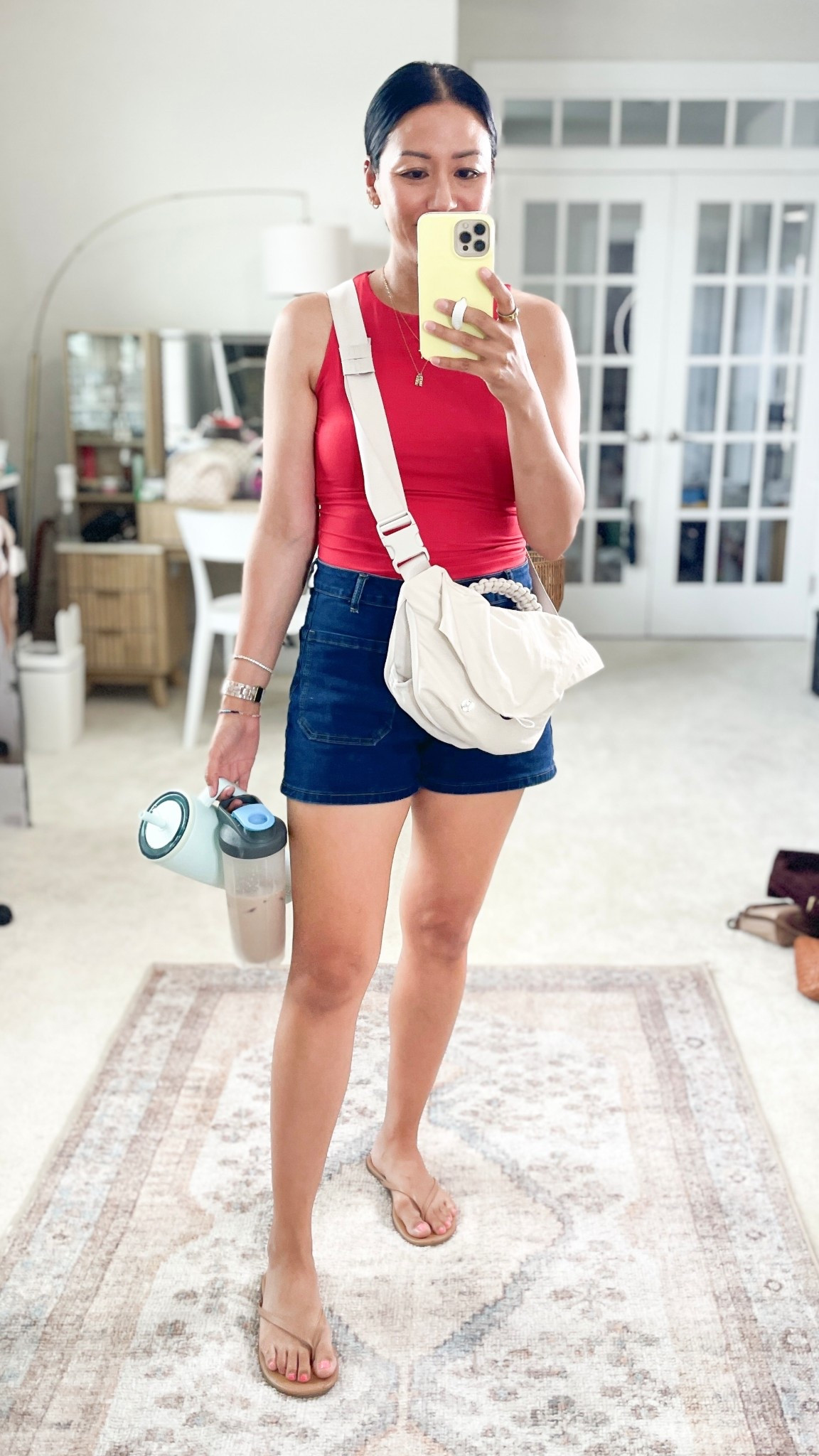 Sized up to medium in tank and shorts
Sandals are true to size 
