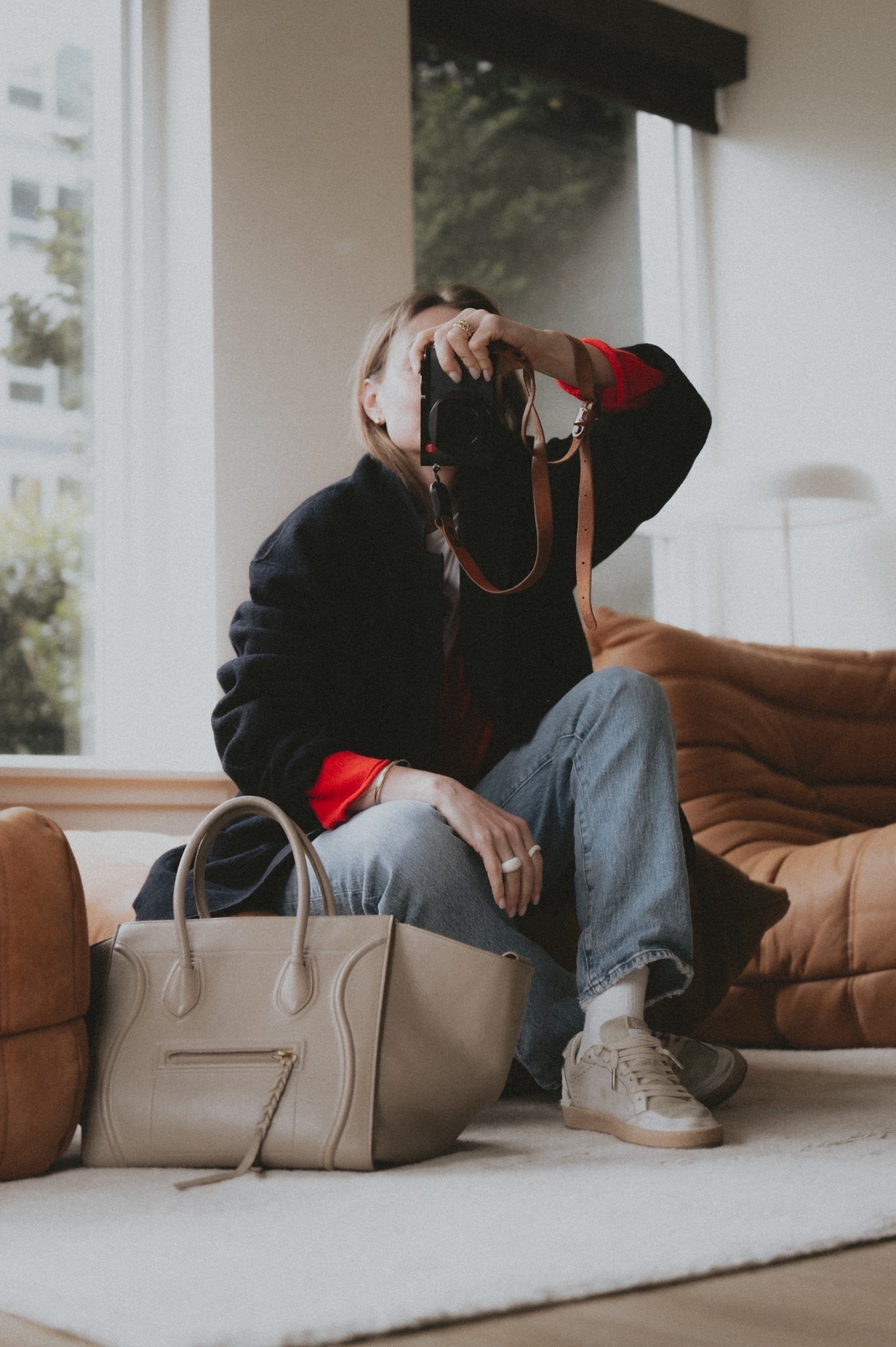 On a day like this ☔️ a little pick me up in the form of @guestinresidence Everywhere cardigan in 🌶️ chili red was necessary. 
Styled with @Madewell The Longline Jean + Golden Goose ballstar sneakers + Celine phantom luggage + Buck Mason felted chore coat. 
Jewelry @Mejuri 

#LTKWorkwear #LTKSeasonal #LTKootd