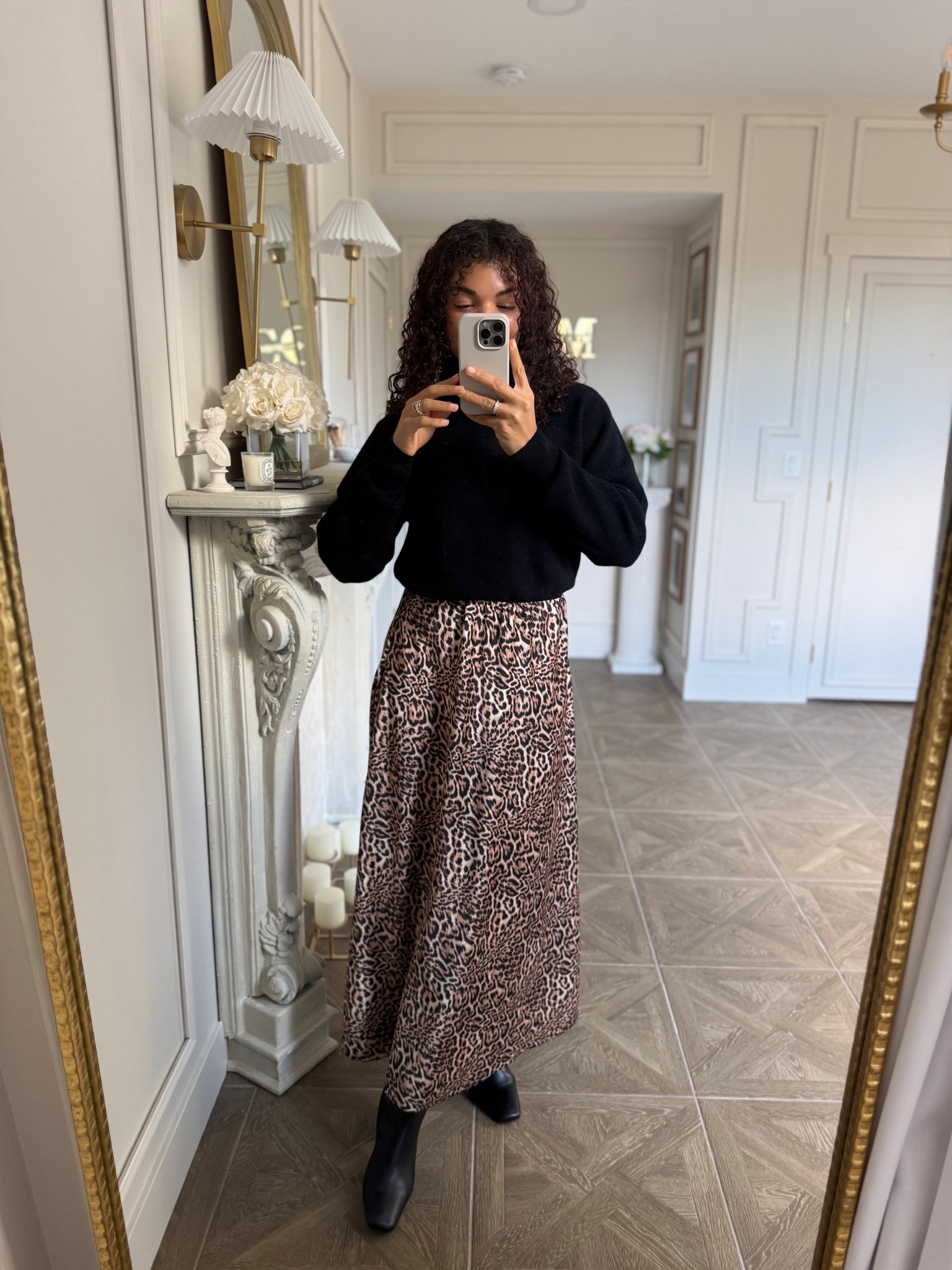 Stylish fall outfit idea: black turtleneck, leopard print slip skirt, and knee high boots 

#LTKSeasonal #LTKStyleTip