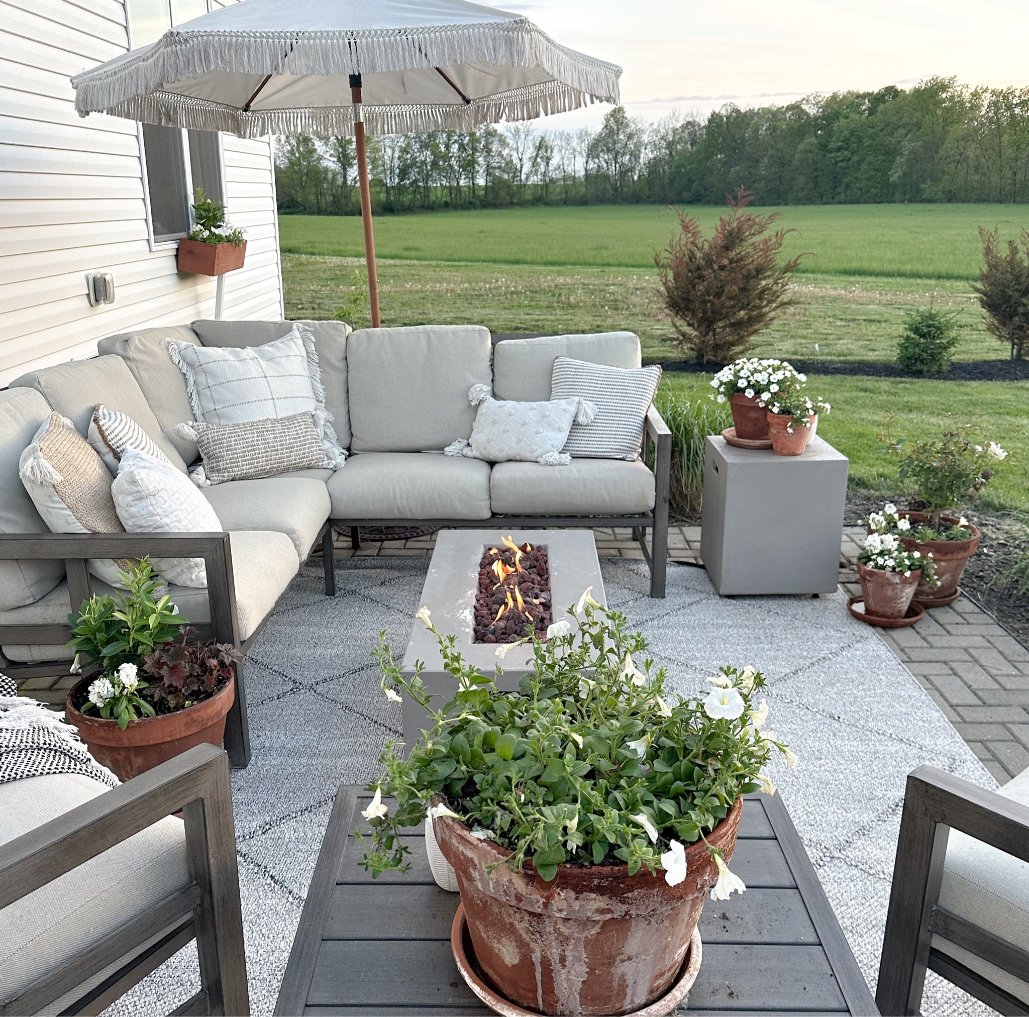 Back patio refresh! Outdoor living / furniture / rug / umbrella / spring / studio McGee / boutique rugs / target 

#LTKSeasonal #LTKFind #LTKhome