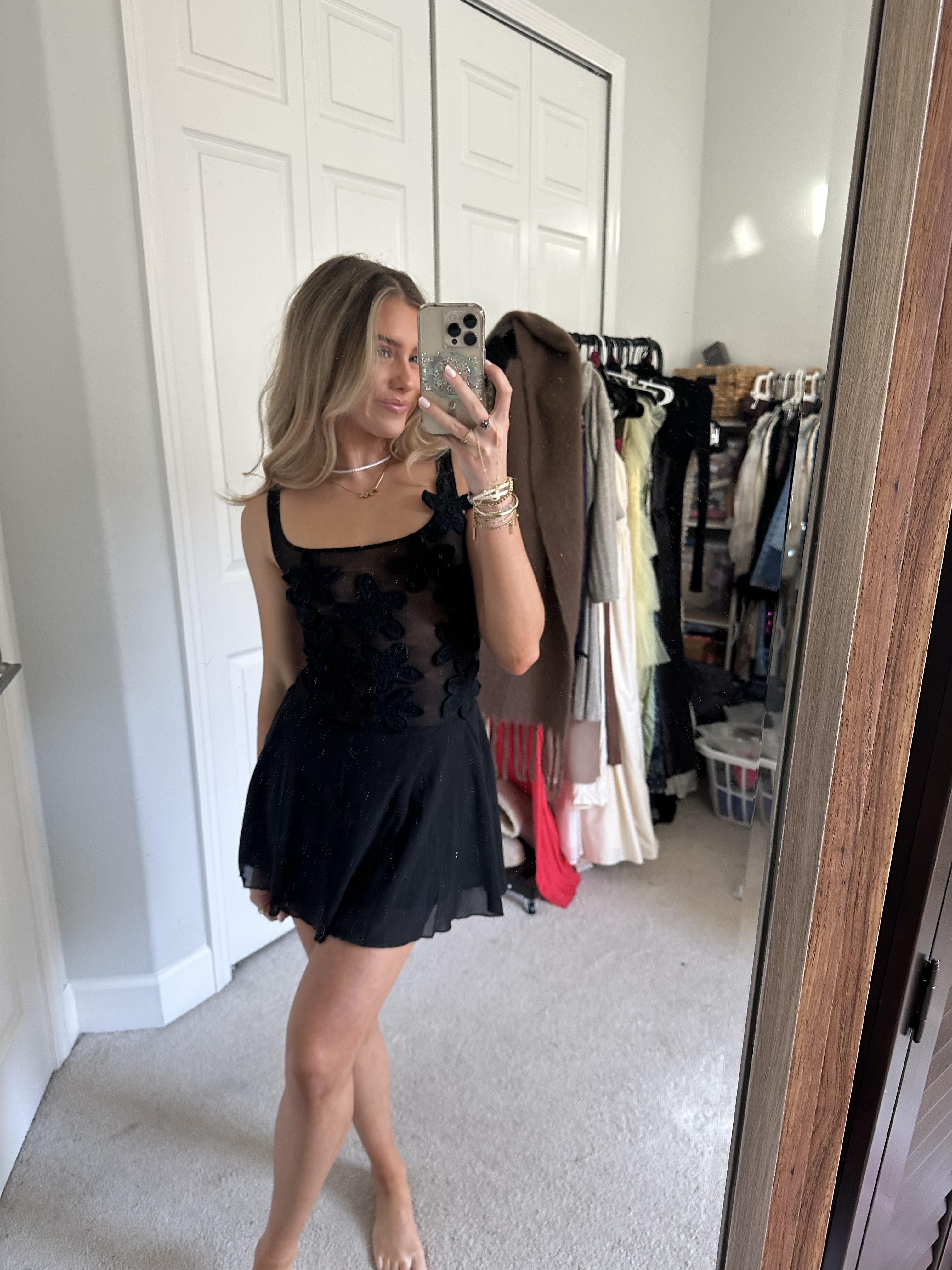 Step into elegance with the MELANIE Mesh Mini Dress with Flowers, a show-stopping piece that blends delicate charm with modern style. Featuring a flattering square neckline and a low back, this dress exudes sophistication from every angle. The fitted bodice, adorned with intricate crochet flower details, adds a touch of whimsy and femininity, while the airy mesh fabric creates a light, graceful look. Fully lined for comfort, the mini-length skirt provides just the right balance of allure and coverage. 

#LTKStyleTip #LTKWedding #LTKParties