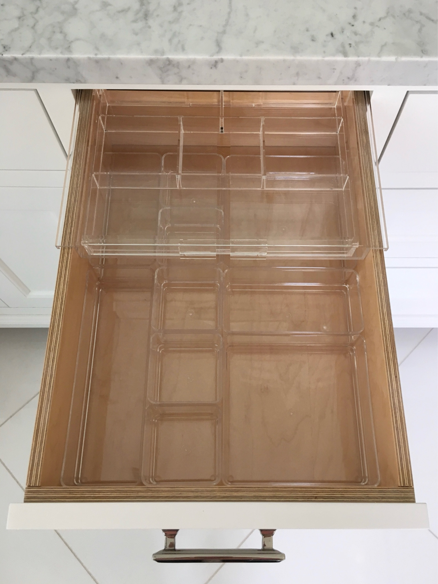 If you are limited on bathroom storage space, this is a great way to maximize! I love to add my standard acrylic drawer organizers to the base of the drawer…. and then add an expandable acrylic divider that sits on top of the lip of the drawer frame. You can see it here without any products organized in it – I will be posting a photo that includes the drawer full of items so that you can see the difference. I have linked products from both Amazon as well as the Container Store!

#LTKbeauty #LTKhome #LTKMostLoved