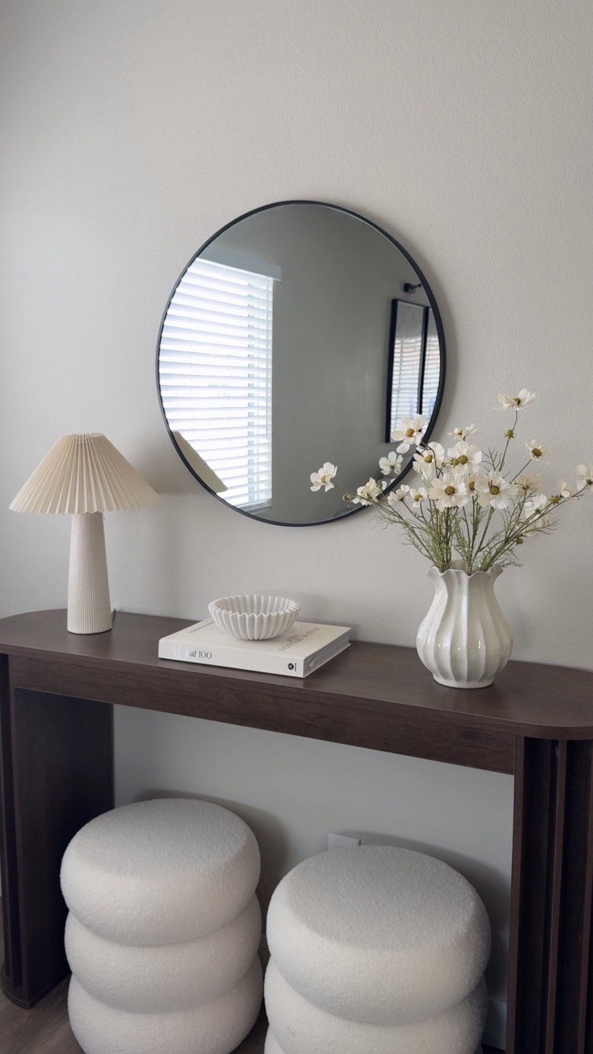 Loving the elegant touch of the console table and the cozy vibe of the ottomans. 🌷🌸

#LTKSeasonal #LTKHome