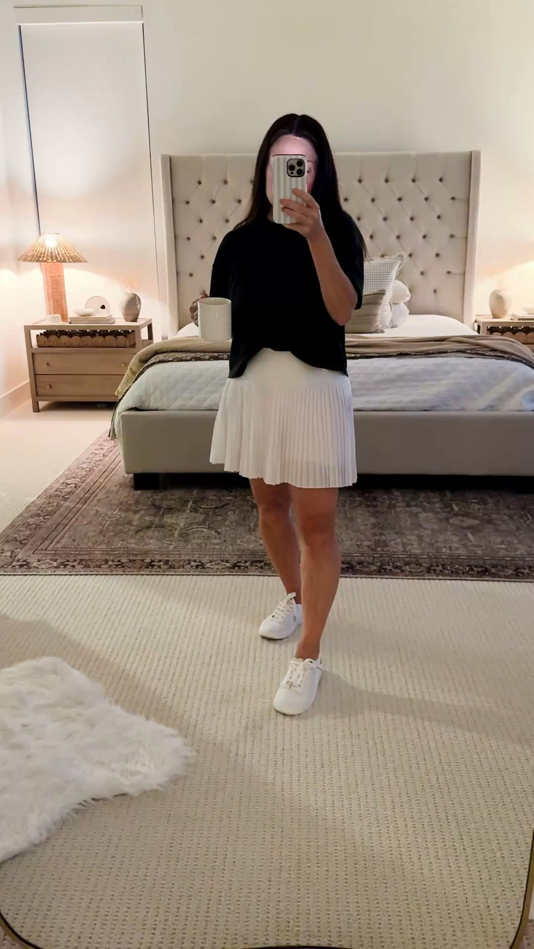 Easy everyday outfit you’ll keep reaching for 🤍 this pleated white skirt is so flattering and easy to dress up or down, paired with a relaxed black tee and classic white sneakers for a clean, effortless look that works for coffee runs, errands or casual days out. These are the kind of staples I wear on repeat because they mix and match with everything and always feel put together without trying too hard. Follow me on LTK for daily fashion, home decor & Amazon finds.

#LTKSaleAlert #LTKOver40 #LTKmomlife