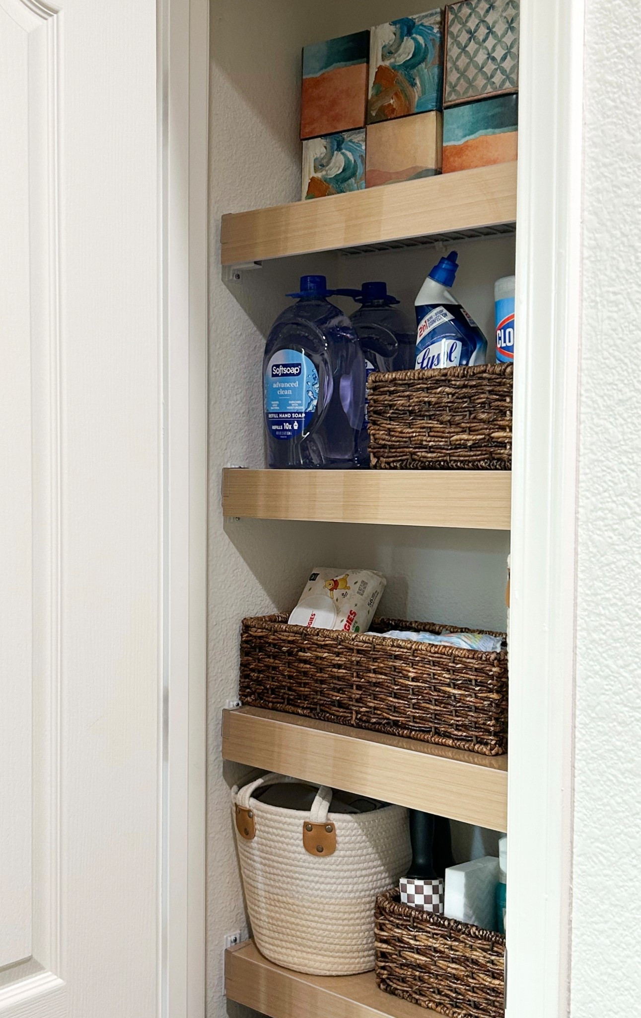 Amazon wire wrack covers! 

These can be made custom. I chose the exact width, depth and thickness of the shelves  

#LTKHome