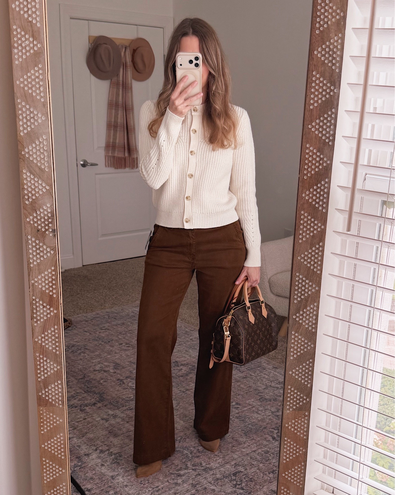 This cream button cardigan from the Nordstrom Anniversary NSale pairs so perfectly with brown wide leg trousers for a fall outfit that looks way more expensive than it is.

#LTKSaleAlert #LTKOver40 #LTKSeasonal