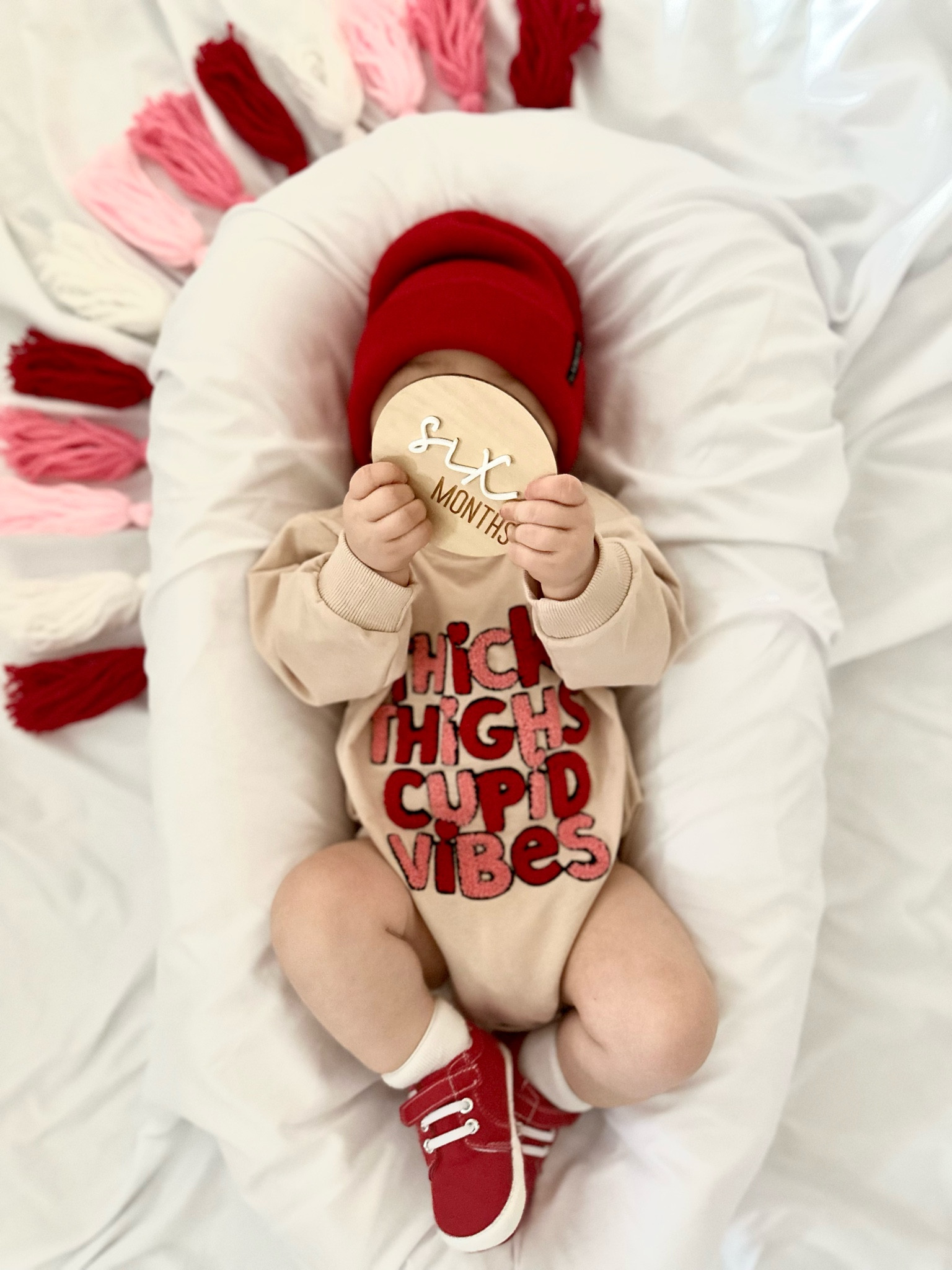 Baby boy/girl Valentine’s Day outfit/ Baby milestone ideas/ Baby photoshoot ideas.

Milestone plaque
Thick thighs Cupid vibes onsie 
Red beanie
Red sneakers

#LTKstyletip #LTKkids #LTKbaby
