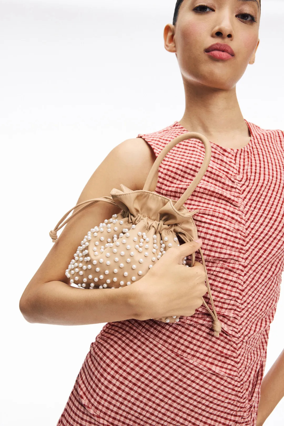 Lele Sadoughi Pearl Sia Drawstring bag | Rent the Runway