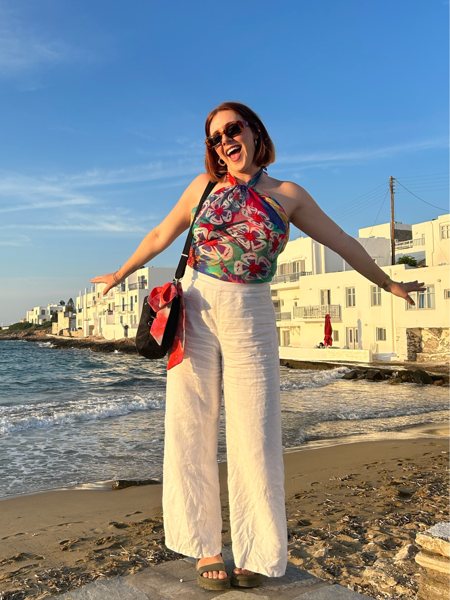 Sunset drinks in Greece, styling a scarf as a top with white linen pants 

#LTKSeasonal #LTKstyletip #LTKtravel