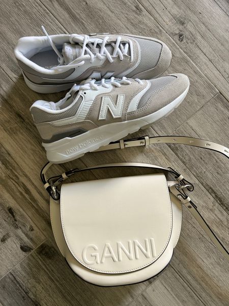 Neutral Gray & white New Balance sneakers and white Ganni crossbody purse  

#LTKFind #LTKshoecrush #LTKitbag