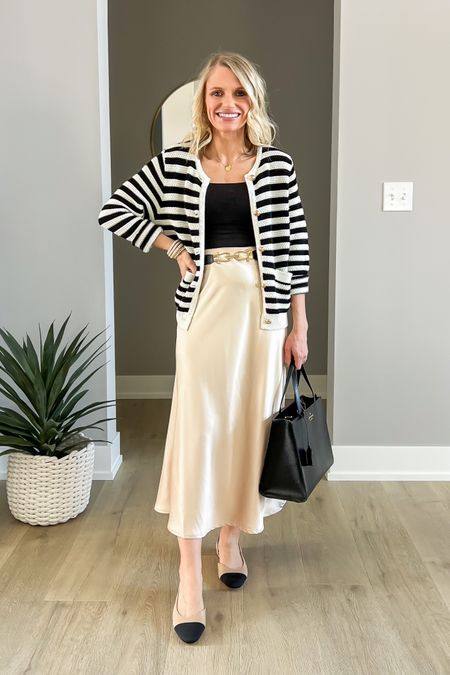 Cute spring workwear outfit with a satin skirt and lady jacket. 
Shirt- xs
Cardigan- small
Skirt- small
Shoes- 7.5

#LTKworkwear #LTKstyletip #LTKfindsunder50