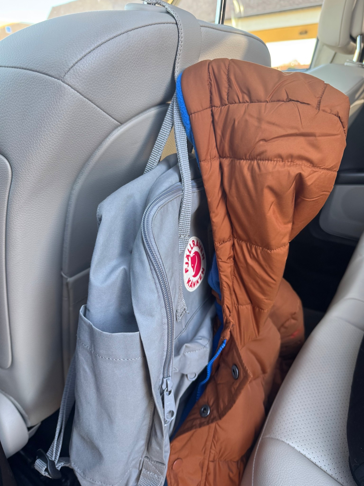 Car hack: get a hook for your kids backpacks & coats (or for your own purse) to keep things off the ground and to keep your purse from sliding off the seat. Perfect for kids when it comes to snow so you aren’t getting your backpack and coats all wet!

#LTKFamily #LTKKids #LTKmomlife