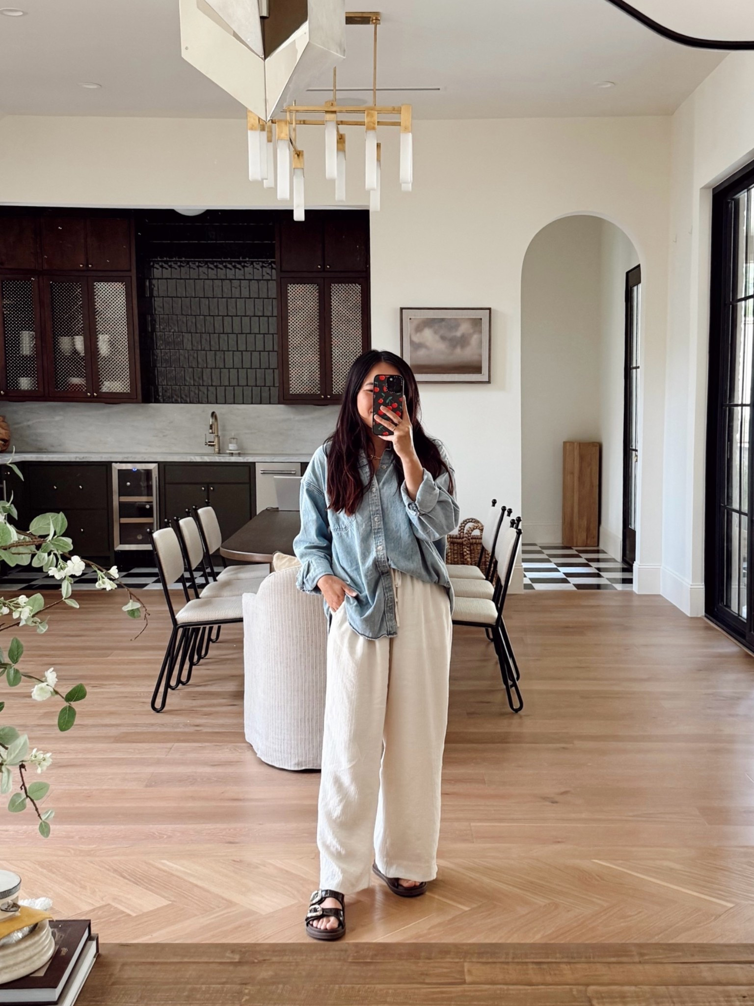 Aritzia denim top has an oversized top. I'm wearing a size small. Bottoms are small petite.