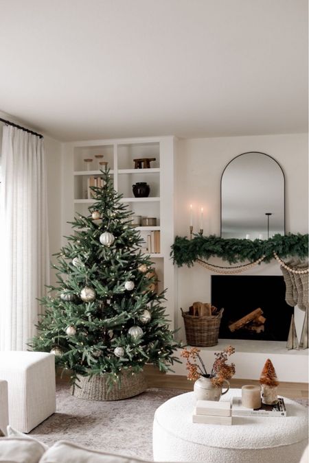 Shop our neutral Christmas living room including my favorite Christmas tree (this is the 6.5’ dual-light option), washable area rug, Amazon curtains, boucle ottoman, arched mirror (under $100), comfy single cushion sofa, and Target ottomans! ☺️

#LTKhome #LTKHoliday #LTKsalealert