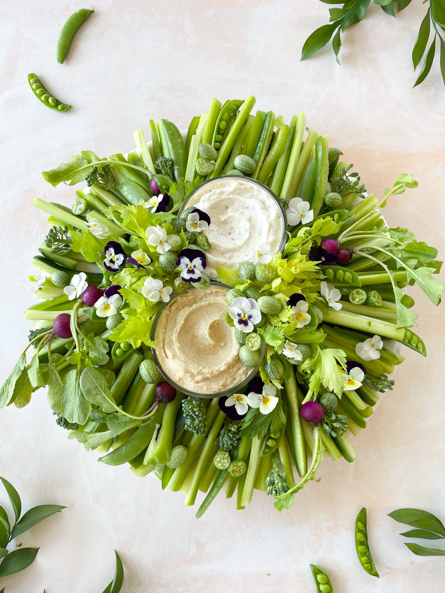 The perfect crudités platter - a cake stand! 

#LTKParties #LTKHome