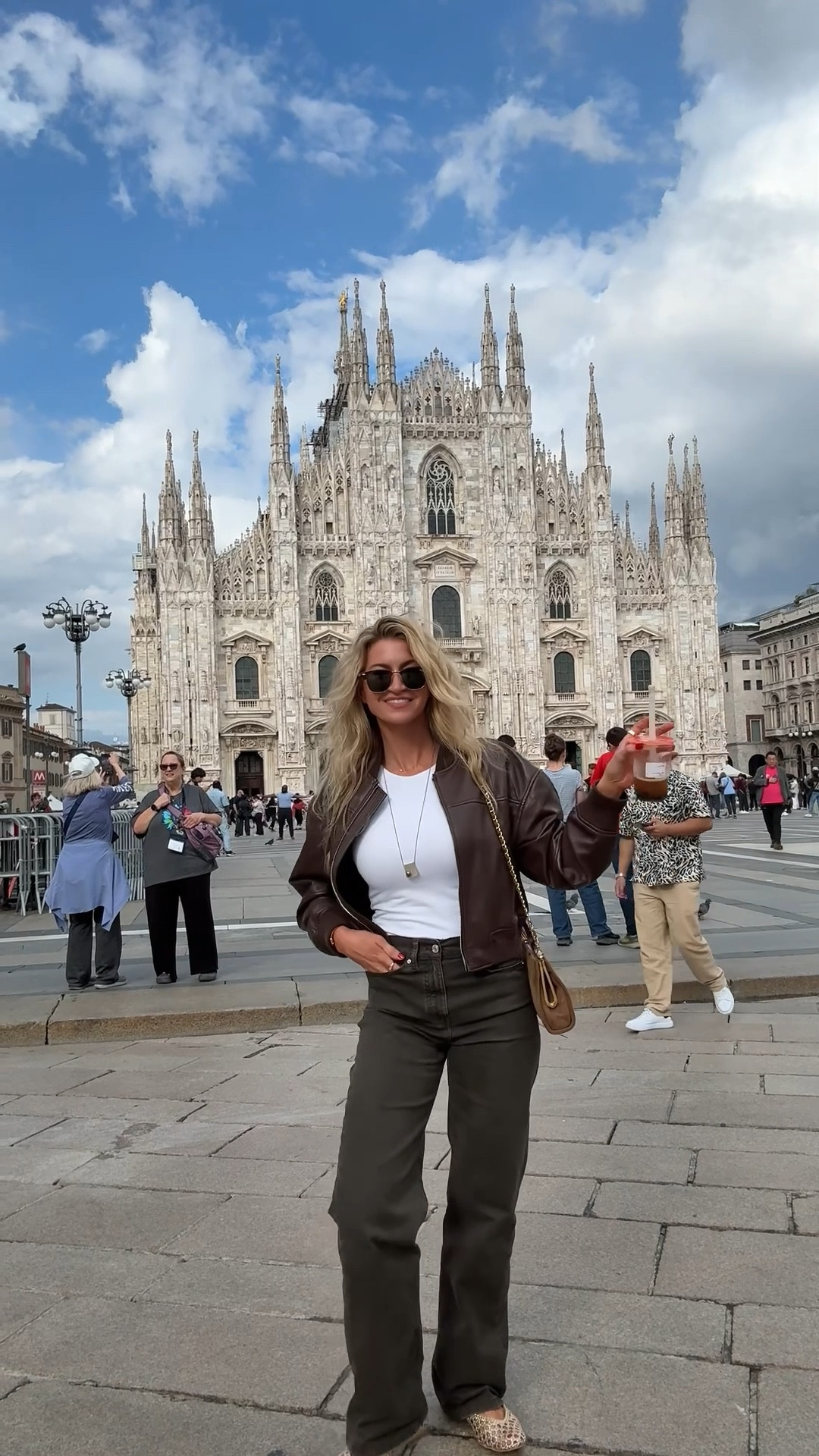 Outfit for the Milan soccer game and our first day in the city.
Leather Bonner jacket: runs TTS, wearing a S (size up if you want an oversized fit, I didn’t). I linked some similar leather bombers and different price points as well!
White fitted tank top: Runs TTS, wearing a S
Brown high rise wide leg denim: runs TTS, wearing a US 2 (has a good amount of stretch to them and they hold their shape - oh my gosh I can’t recommend these enough)
Gold woven flats: Run TTS (they stretched out a little bit on me, but not enough to order down)
Ray ban sunglasses + long silver and tortoise pendant necklace 

#LTKSeasonal #LTKTravel #LTKStyleTip