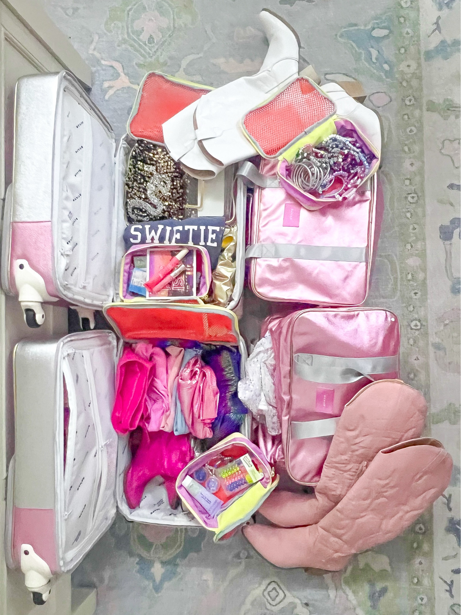 Our bags packed for Taylor Swift! These metallic carry-ons and totes were perfect for my little swifties! 

Luggage is also a great gift for little travelers during the busy holiday season. Wrap these under the tree or grab these for upcoming travels!

Use jami20 for $$ off!*

#LTKKids #LTKFamily #LTKTravel