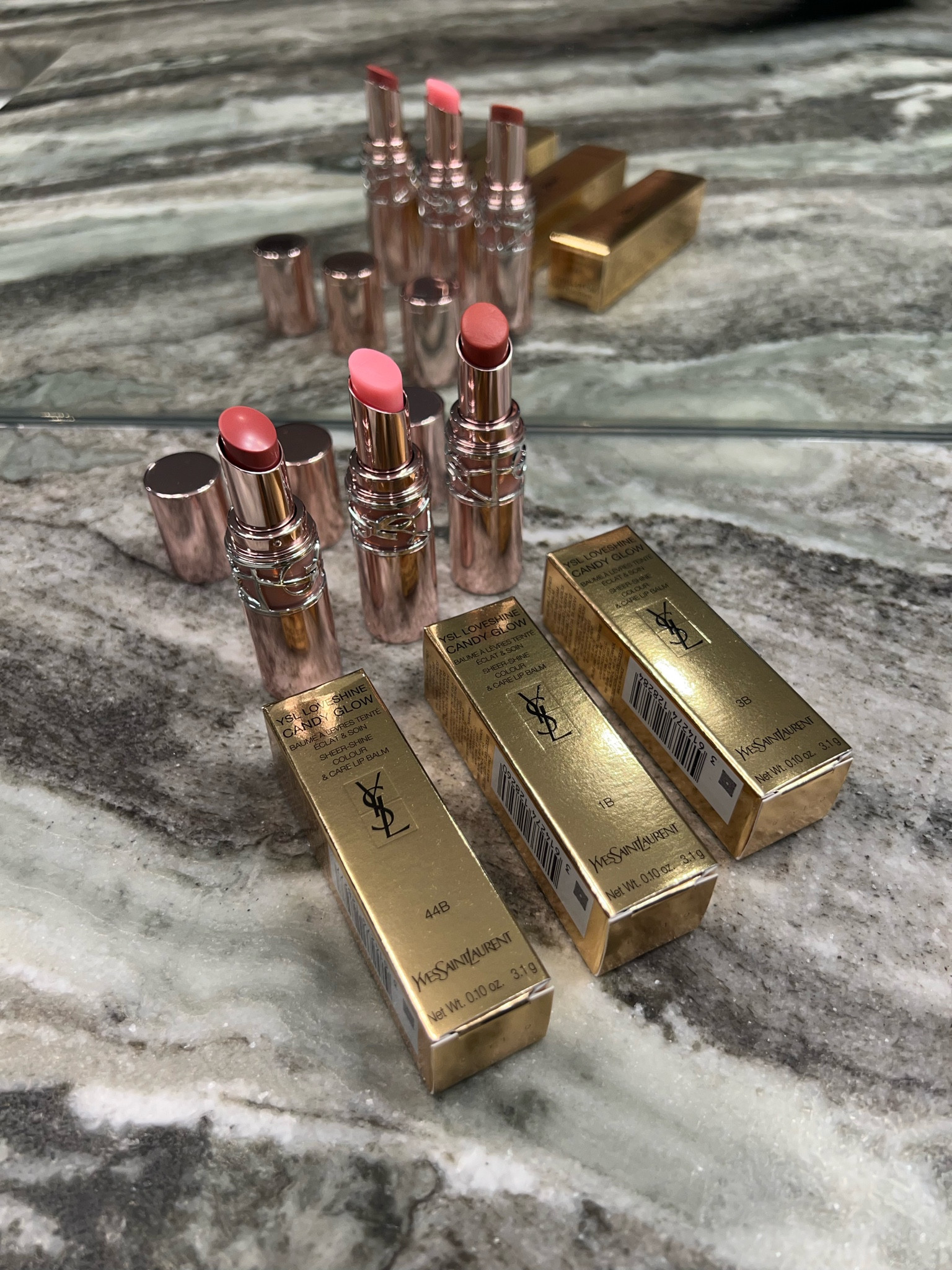 This YSL Candy Glow Tinted Butter Balm is a special treat.

It is a smooth, buttery lip balm providing soft shine and a sheer flush of color—infused with shea butter and maracuja oil for smooth, hydrated lips.

Pictured 44B Nude Lavalliere, 1B Pink Sunrise and 3B Rosewood Blush

#LTKbeauty #LTKsummer #LTKcanada