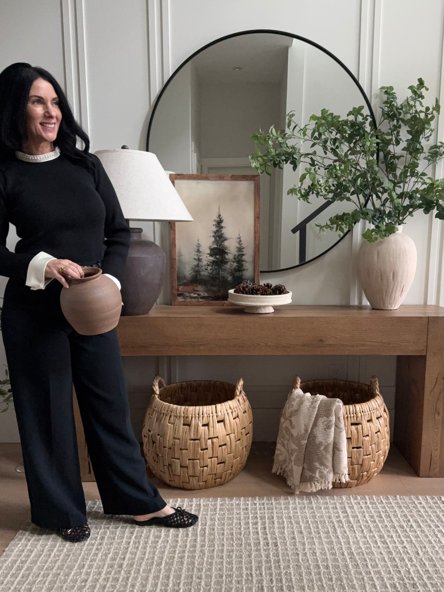 Styling for winter with a slight nod to Spring.. love the woven texture of these large basket.. love the light and airy look! 
Console styling